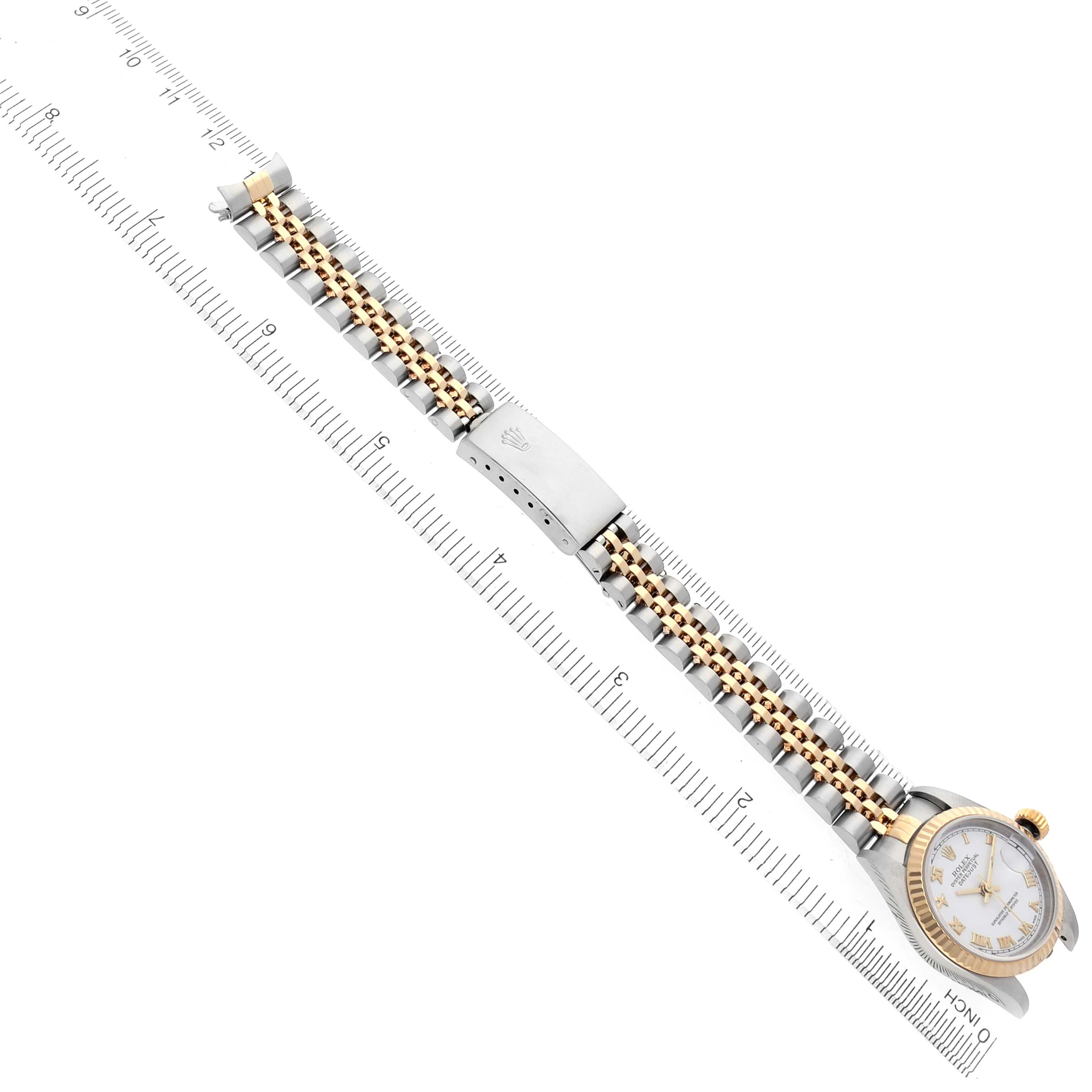 The image shows the Rolex Datejust 79173 Women's Steel and Gold (two tone) White Dial 79173 Women's Steel and Gold (two tone) White Dial watch at an angled top-down view, highlighting its two-tone bracelet and clasp.