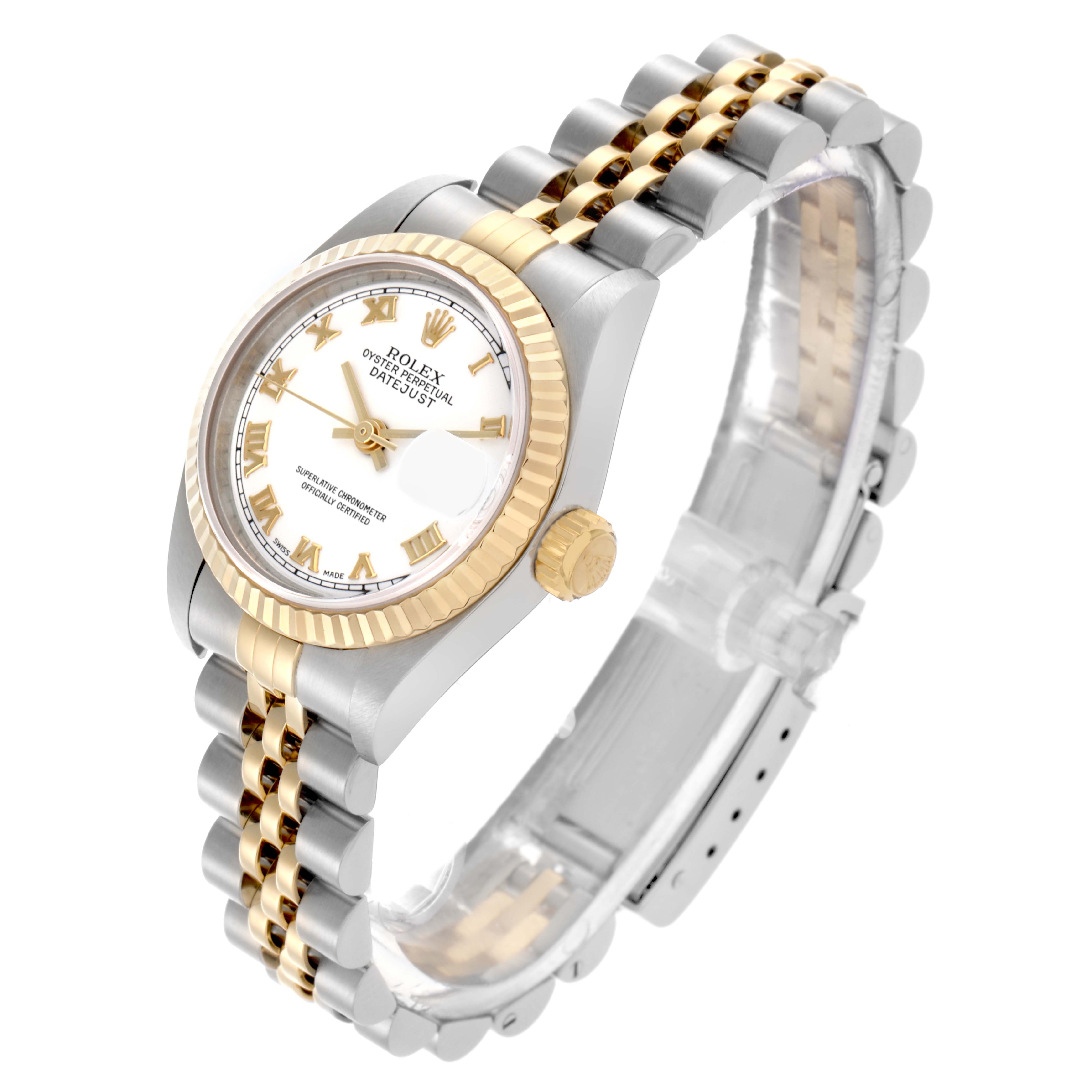 The Rolex Datejust 79173 Women's Steel and Gold (two tone) White Dial 79173 Women's Steel and Gold (two tone) White Dial watch is shown at a slight side angle, highlighting the face, fluted bezel, crown, and Jubilee bracelet.