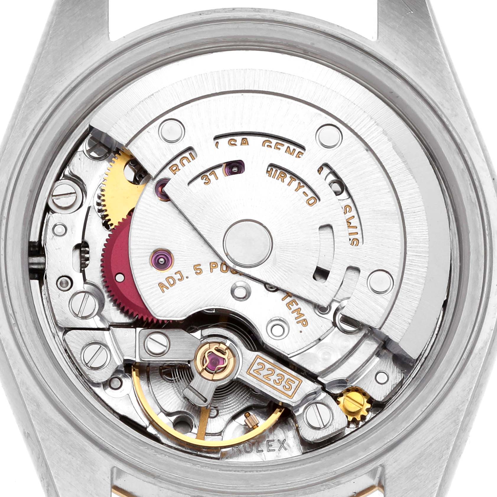 The image shows the movement of a Rolex Datejust 79173 Women's Steel and Gold (two tone) White Dial 79173 Women's Steel and Gold (two tone) White Dial from a rear angle, highlighting its intricate mechanical components.