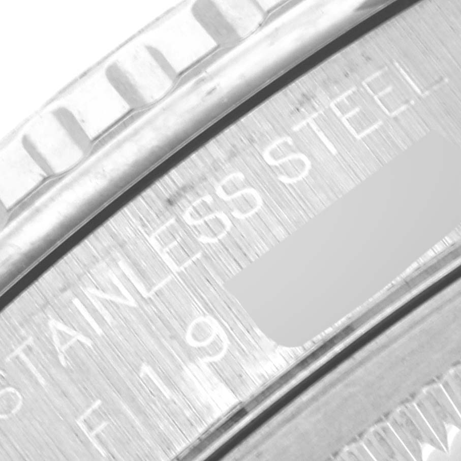 The image features a close-up of the stainless steel bezel on a Rolex Turn-o-Graph 16264 Men
s Stainless Steel Silver Dial 16264 Men
s Stainless Steel Silver Dial watch.