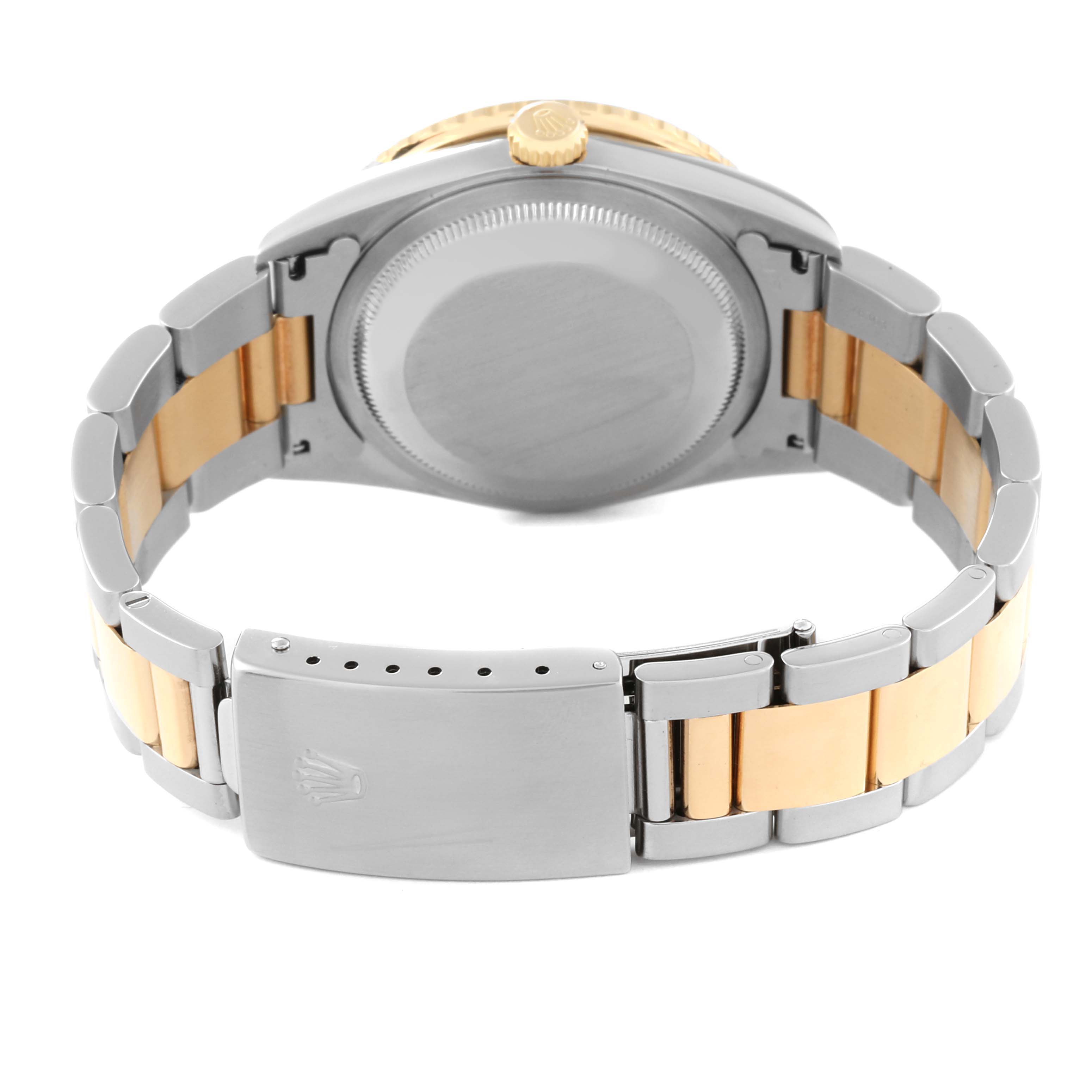 The Rolex Turn-o-Graph 16263 Men
s Steel and Gold (two tone) Silver Dial 16263 Men
s Steel and Gold (two tone) Silver Dial is shown from the back, highlighting its bracelet and clasp.