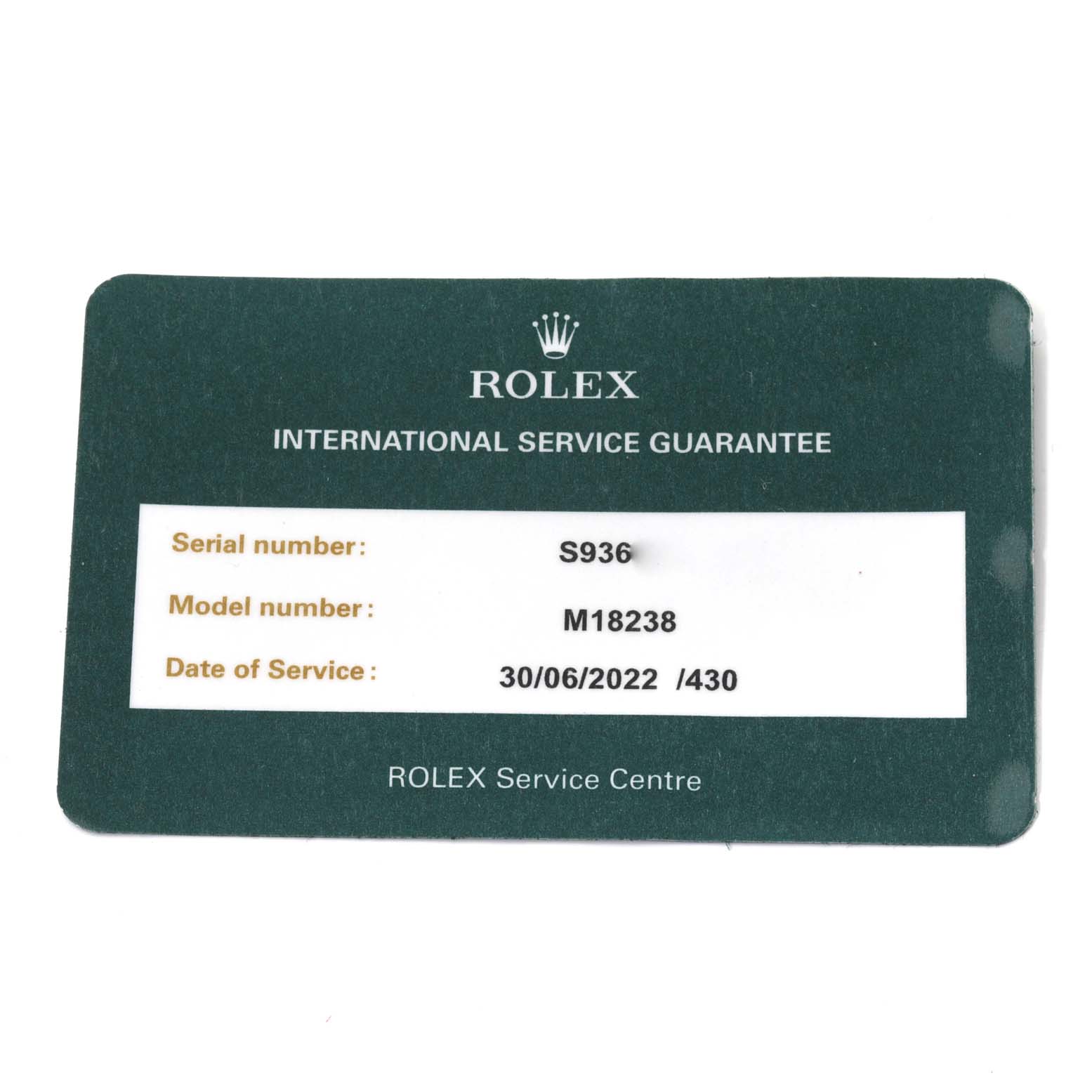 This image shows a Rolex International Service Guarantee card for a Rolex President 18238 Men
s Yellow Gold Champagne Dial 18238 Men
s Yellow Gold Champagne Dial model M18238 watch.