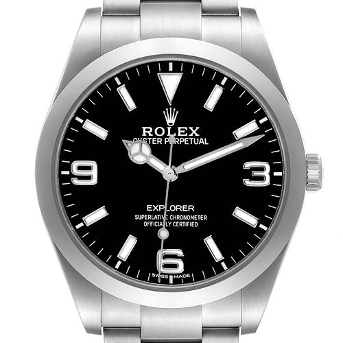 The Rolex Explorer watch is shown from a front angle displaying the dial, bezel, crown, and part of the bracelet.