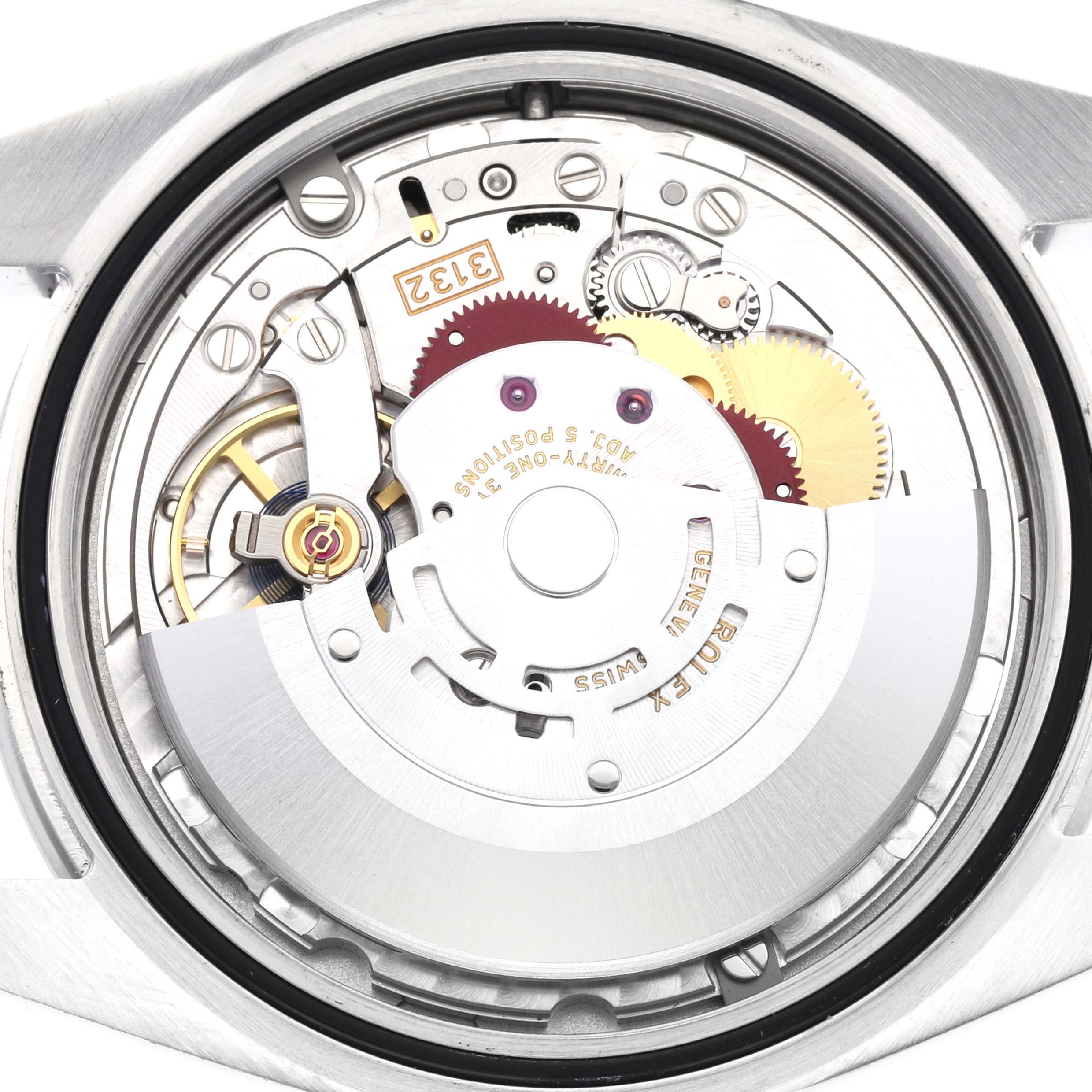 The image shows the internal mechanism of a Rolex Explorer 214270 Men's Stainless Steel Black Dial 214270 Men's Stainless Steel Black Dial watch viewed from the back.