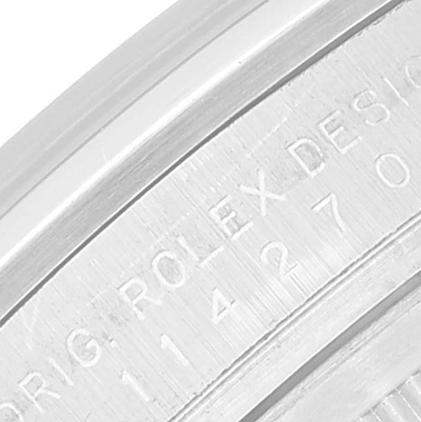 This image shows a close-up angle of the case with serial and model numbers for the Rolex Explorer 114270 Men's Stainless Steel Black Dial 114270 Men's Stainless Steel Black Dial watch.