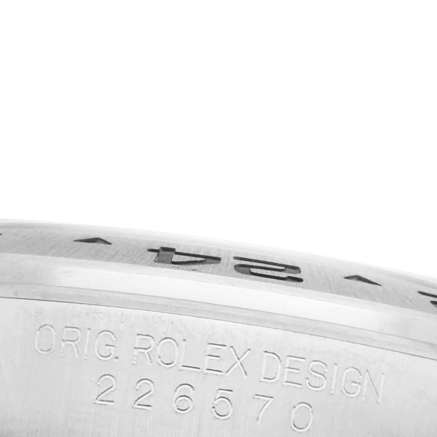The image shows a close-up of the side of the Rolex Explorer 226570 Men's Stainless Steel White Dial 226570 Men's Stainless Steel White Dial, focusing on the bezel and engravings.
