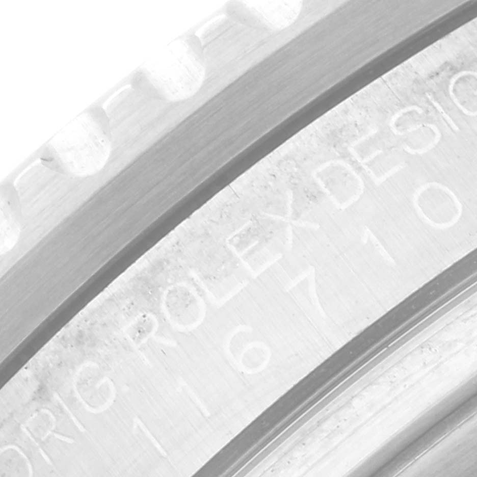 The image shows a close-up of the bezel edge and engraved case side of a Rolex GMT-Master 116710 Men
s Stainless Steel Black Dial 116710 Men
s Stainless Steel Black Dial watch.