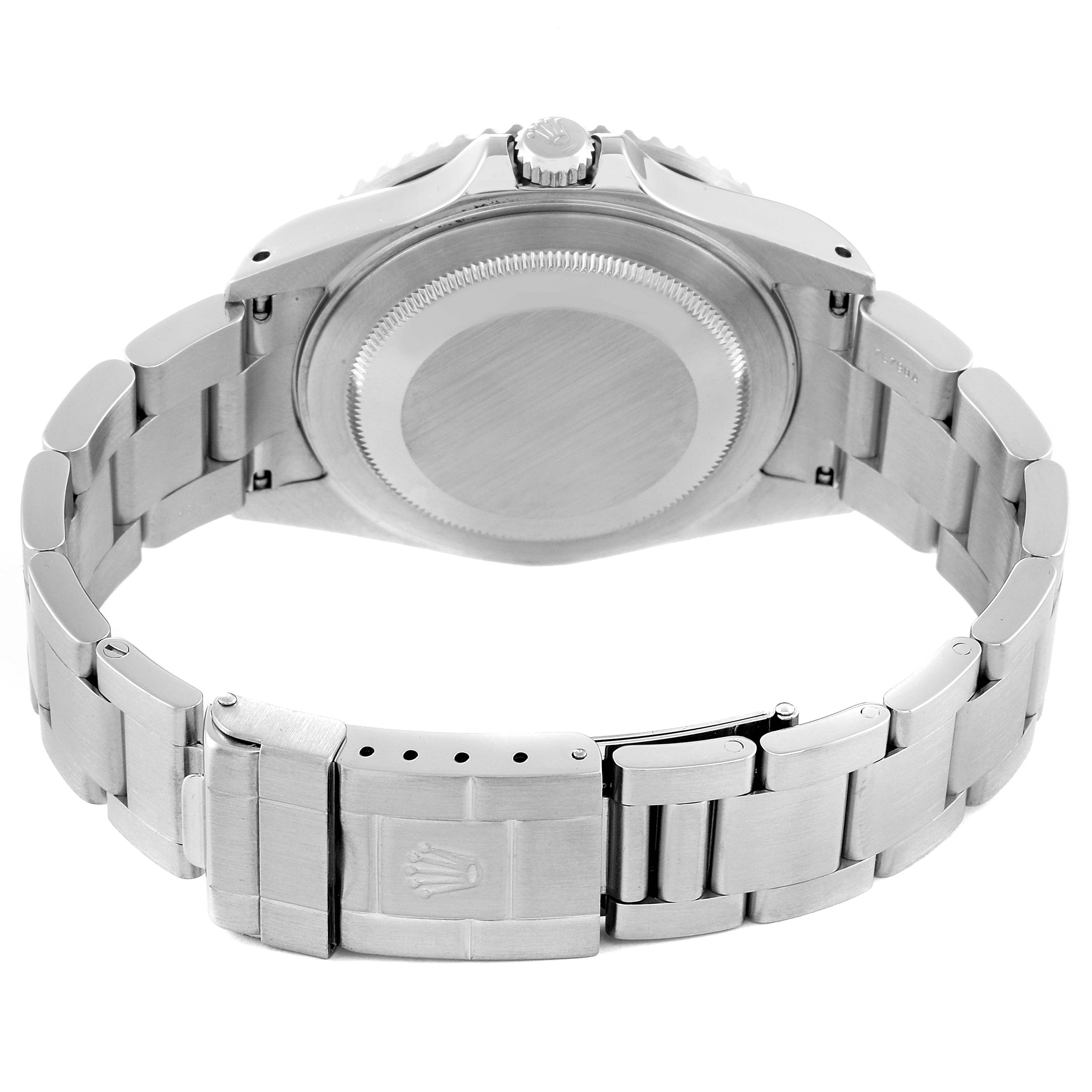 The image shows the back view of a Rolex GMT-Master 16710 Men
s Stainless Steel Black Dial 16710 Men
s Stainless Steel Black Dial watch, highlighting the case back, crown, and bracelet with clasp.