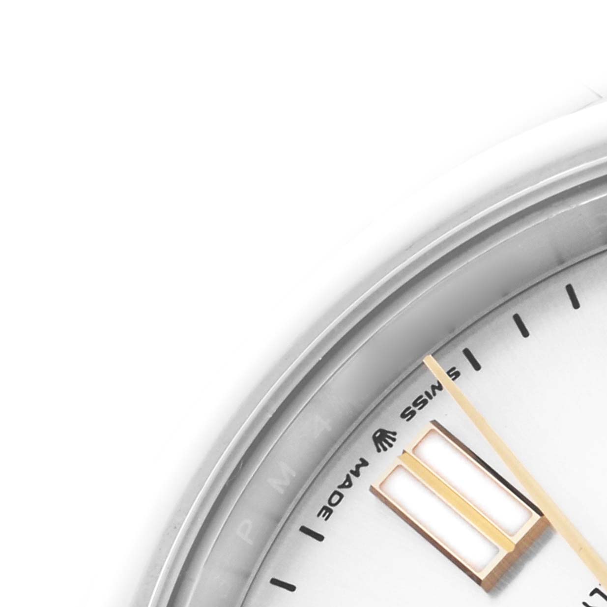 The image shows a close-up of the dial's edge and hour markers on a Rolex Oyster Perpetual 124300 Men's Stainless Steel Silver Dial 124300 Men's Stainless Steel Silver Dial watch.