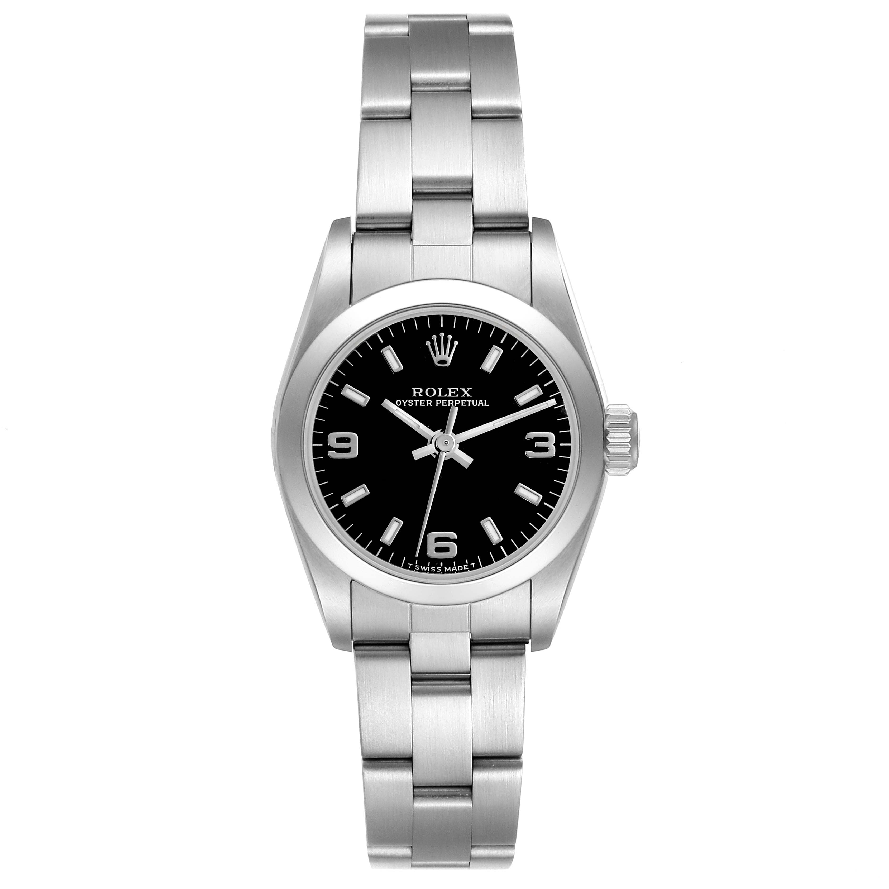 The Rolex Oyster Perpetual 67180 Women's Stainless Steel Black Dial 67180 Women's Stainless Steel Black Dial watch is shown from a top-down angle, displaying the face, bracelet, case, and crown.