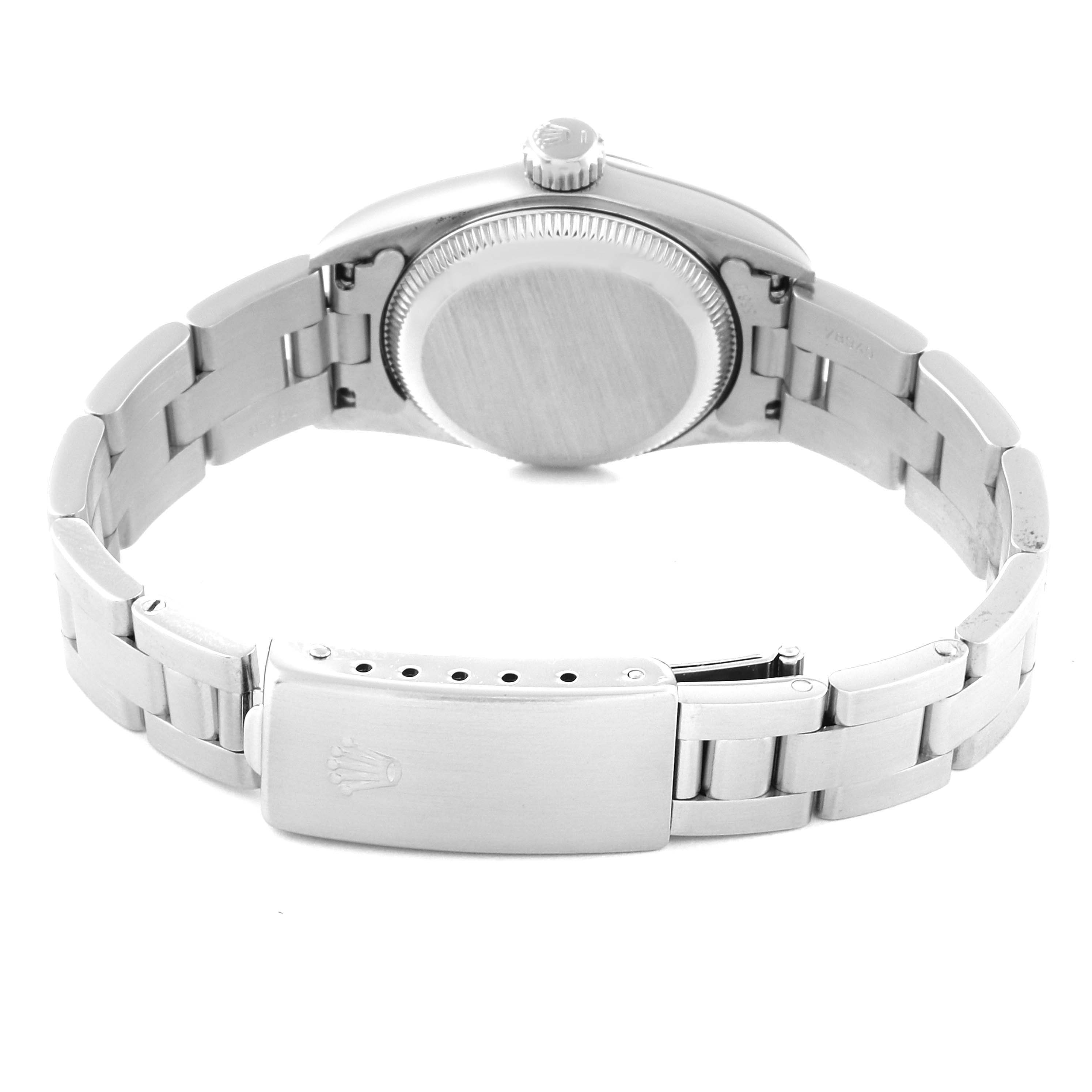 This image shows the back of the Rolex Oyster Perpetual 67180 Women's Stainless Steel Black Dial 67180 Women's Stainless Steel Black Dial watch, highlighting the case back, crown, and metal bracelet.