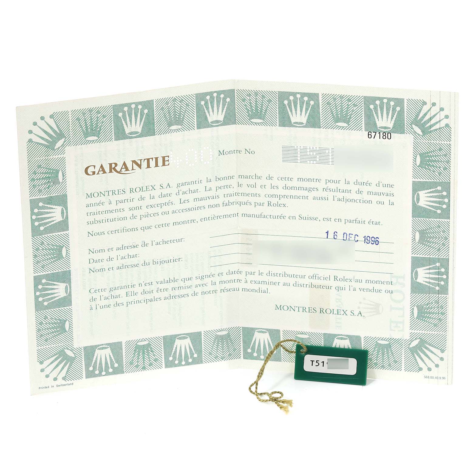 The image shows a warranty document and a green tag for a Rolex Oyster Perpetual 67180 Women's Stainless Steel Black Dial 67180 Women's Stainless Steel Black Dial.