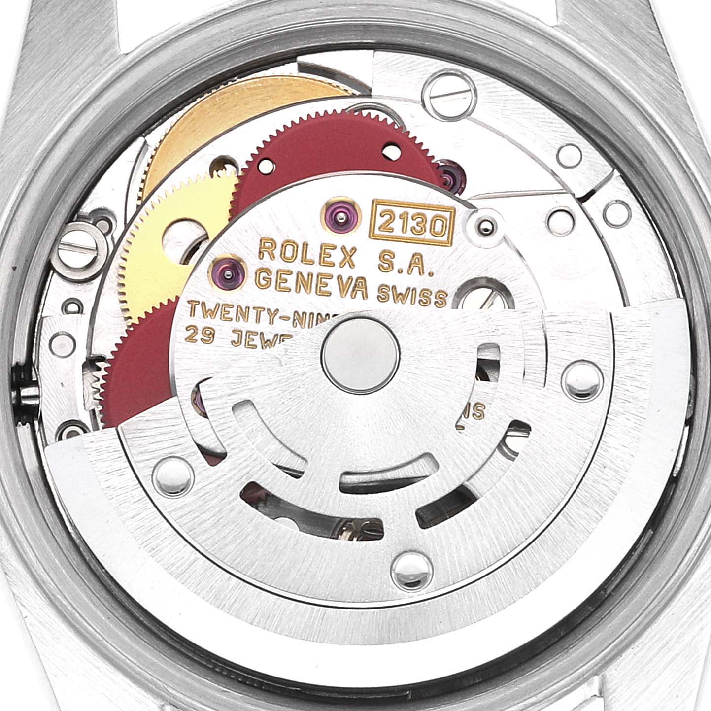 This image shows a close-up of the movement and inner mechanism of a Rolex Oyster Perpetual 67180 Women's Stainless Steel Black Dial 67180 Women's Stainless Steel Black Dial watch.