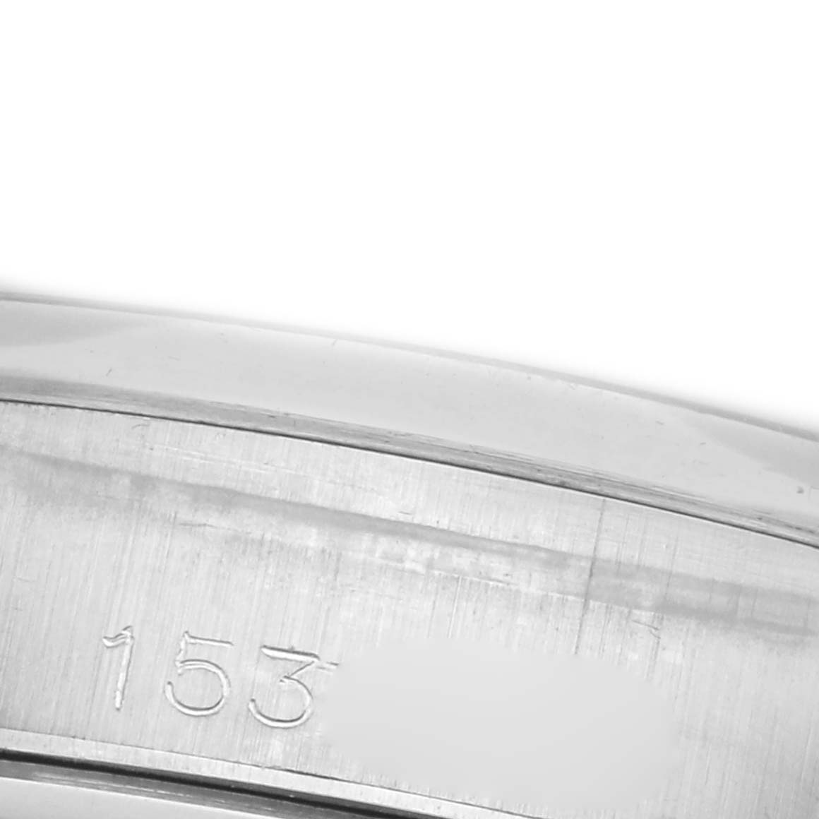 The image shows a close-up of the inner case, highlighting the serial number area of a Rolex Date 6694 Men's Stainless Steel Blue Dial 6694 Men's Stainless Steel Blue Dial model.