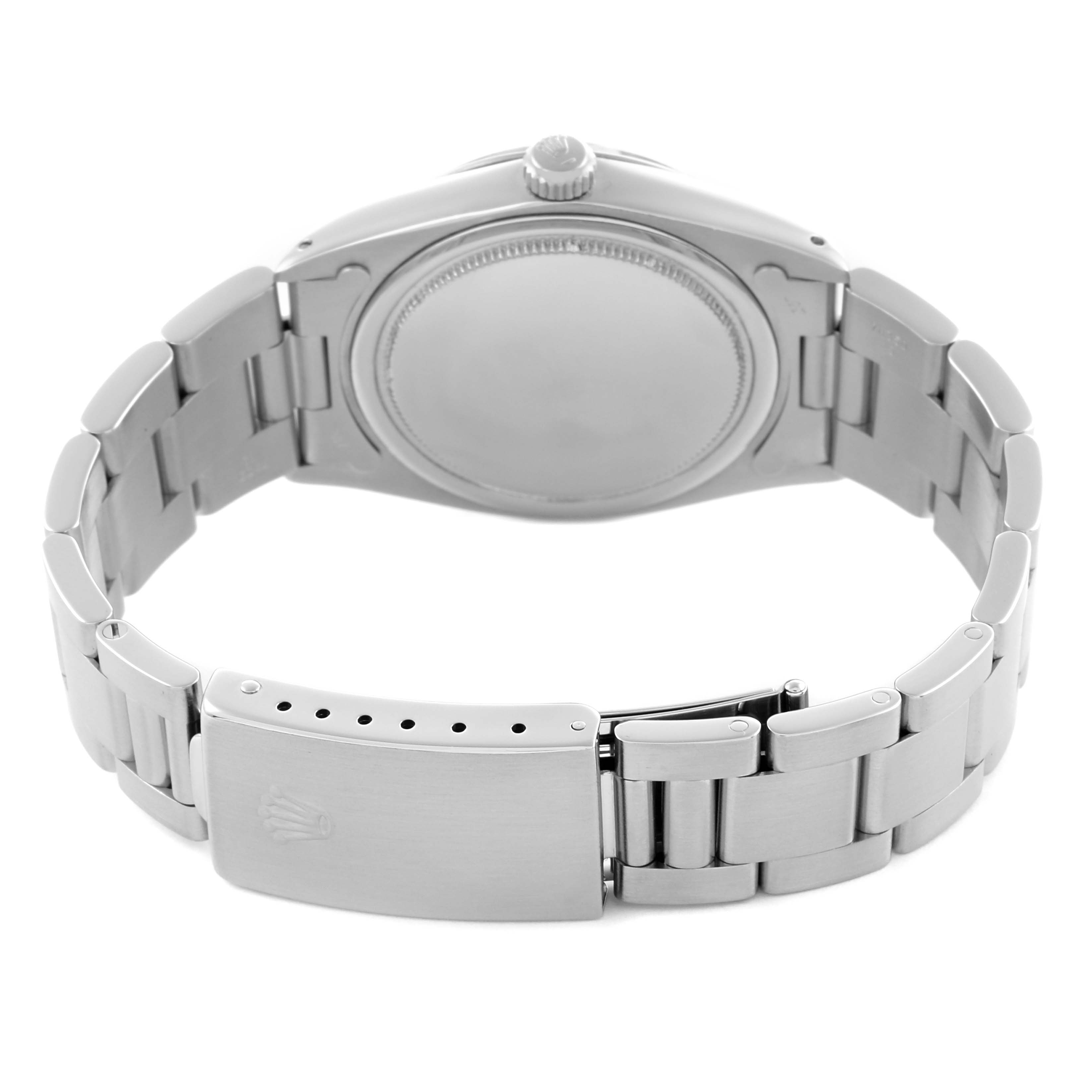 The image shows the back of a Rolex Date 6694 Men's Stainless Steel Blue Dial 6694 Men's Stainless Steel Blue Dial watch, highlighting the stainless steel bracelet and clasp.