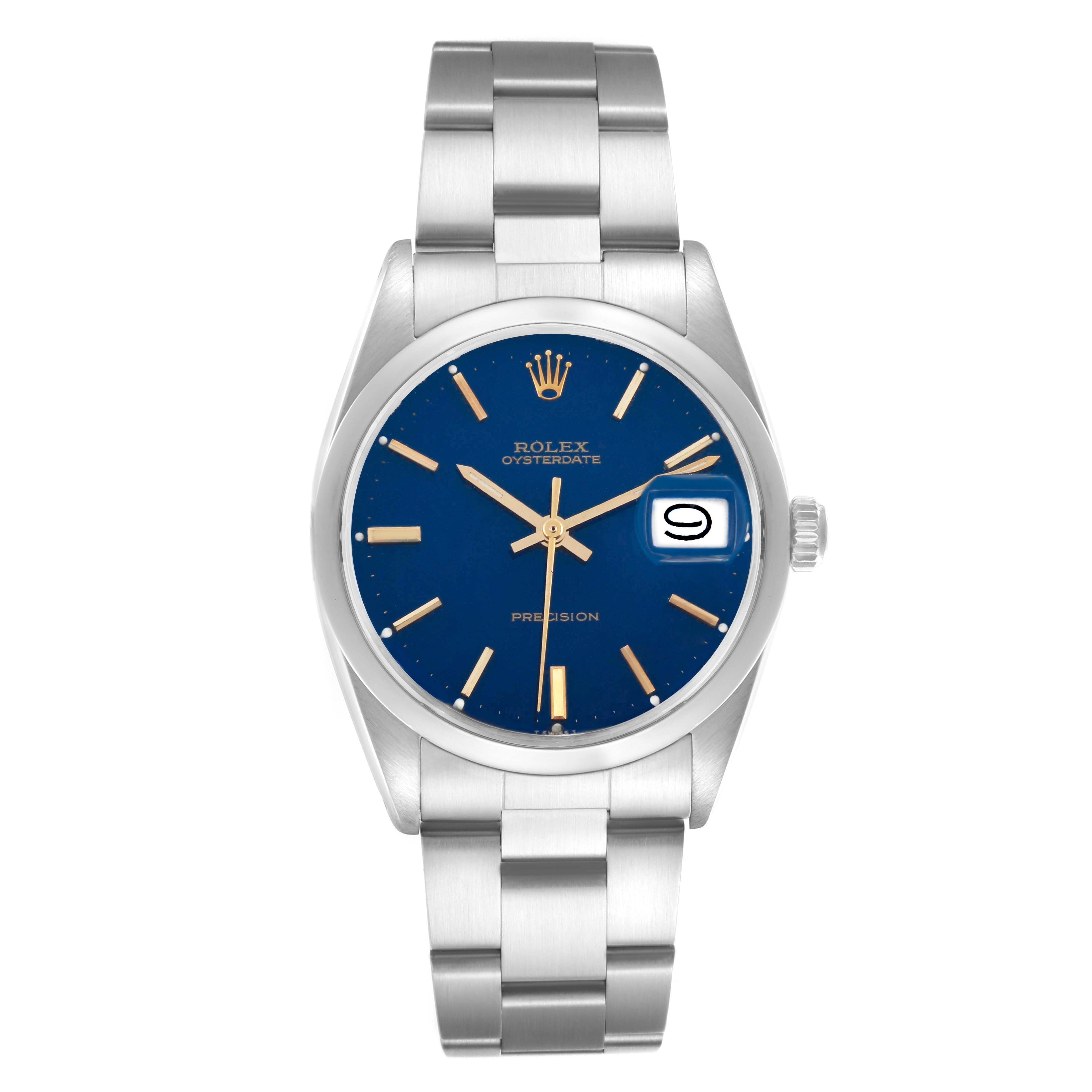 The Rolex Date 6694 Men's Stainless Steel Blue Dial 6694 Men's Stainless Steel Blue Dial model is shown from a top-down angle, displaying the blue dial, bracelet, and crown.