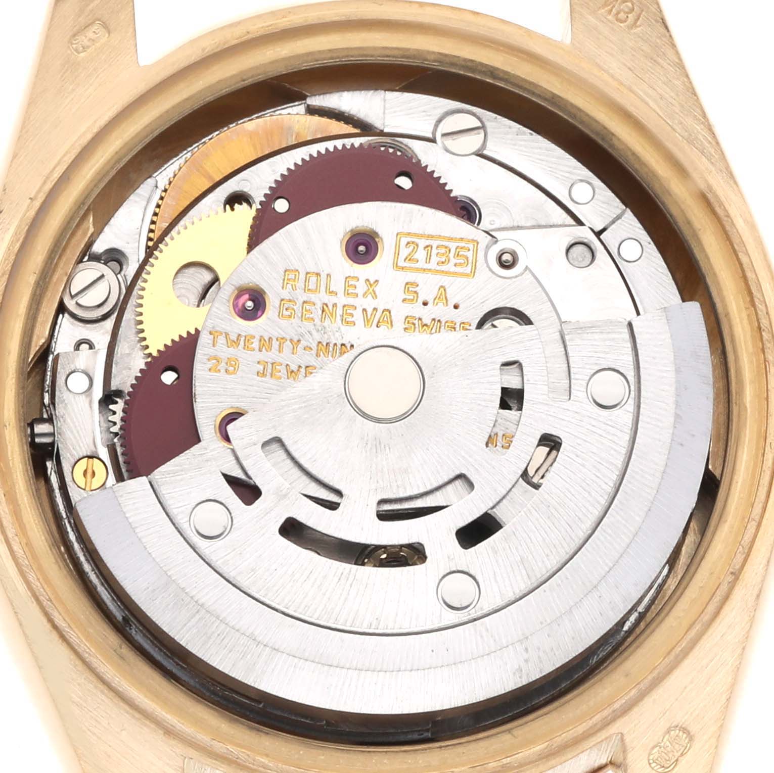 The image shows the movement mechanism of a Rolex President 69178 Women's Yellow Gold Champagne Dial 69178 Women's Yellow Gold Champagne Dial model, including gears and the rotor, viewed from the back.