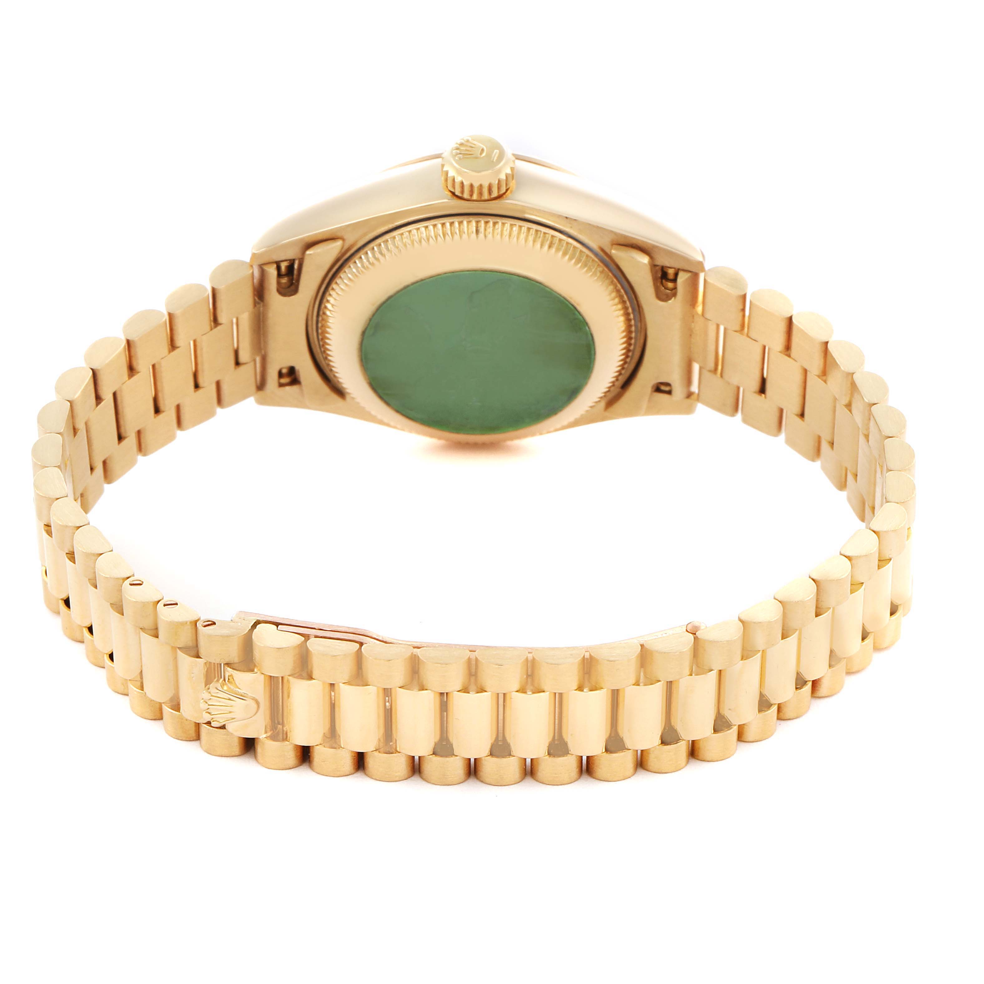The image shows the back and bracelet of a Rolex President 69178 Women's Yellow Gold Champagne Dial 69178 Women's Yellow Gold Champagne Dial watch, highlighting the case back and crown from a slightly elevated angle.