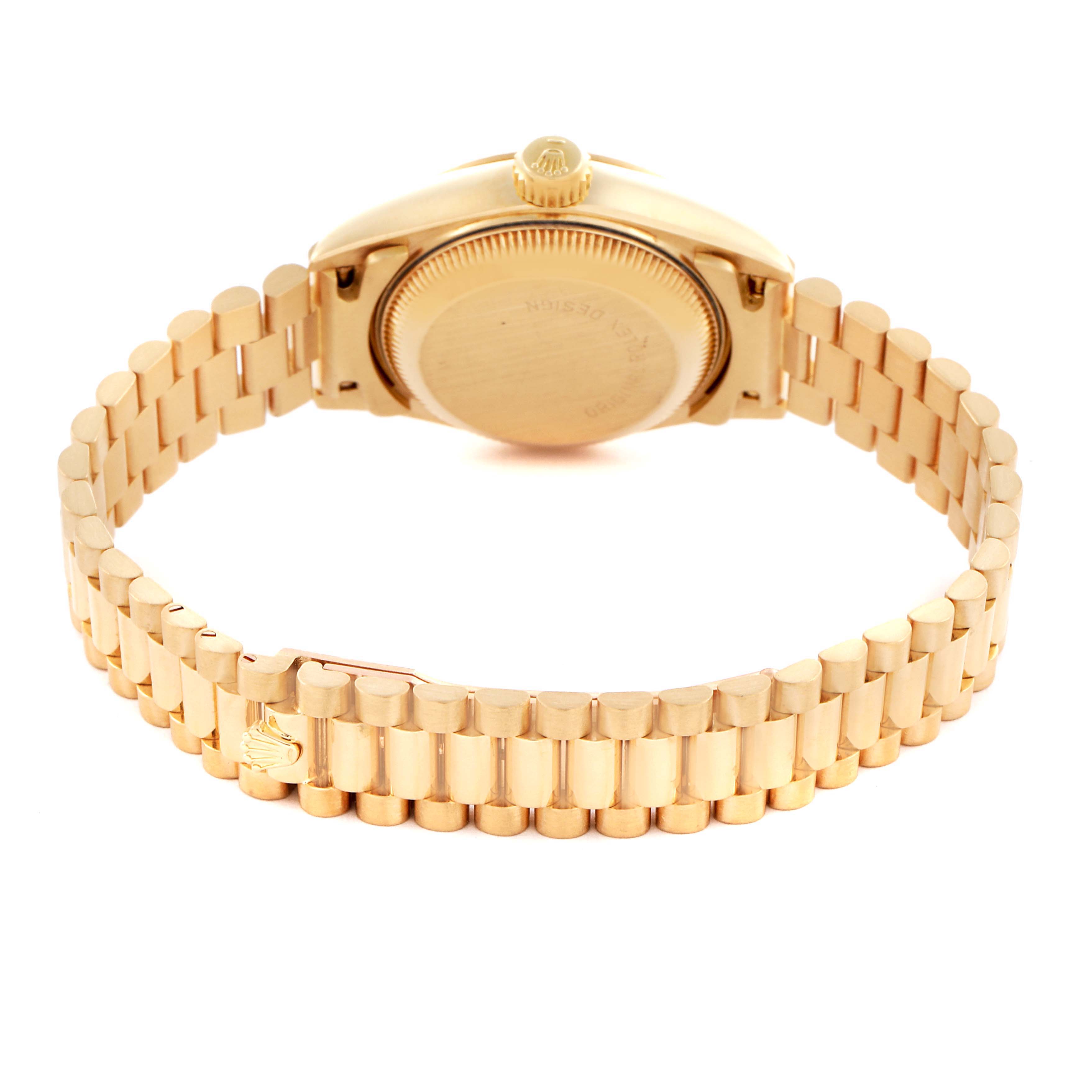 The image shows the back and bracelet of a Rolex President 69178 Women's Yellow Gold Champagne Dial 69178 Women's Yellow Gold Champagne Dial model, highlighting the gold case and signature bracelet design.