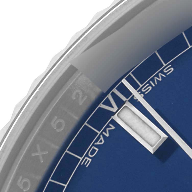 The image shows a close-up of the dial of a Rolex President 118139 Men's White Gold Blue Dial 118139 Men's White Gold Blue Dial model, focusing on the hour marker and part of the bezel.