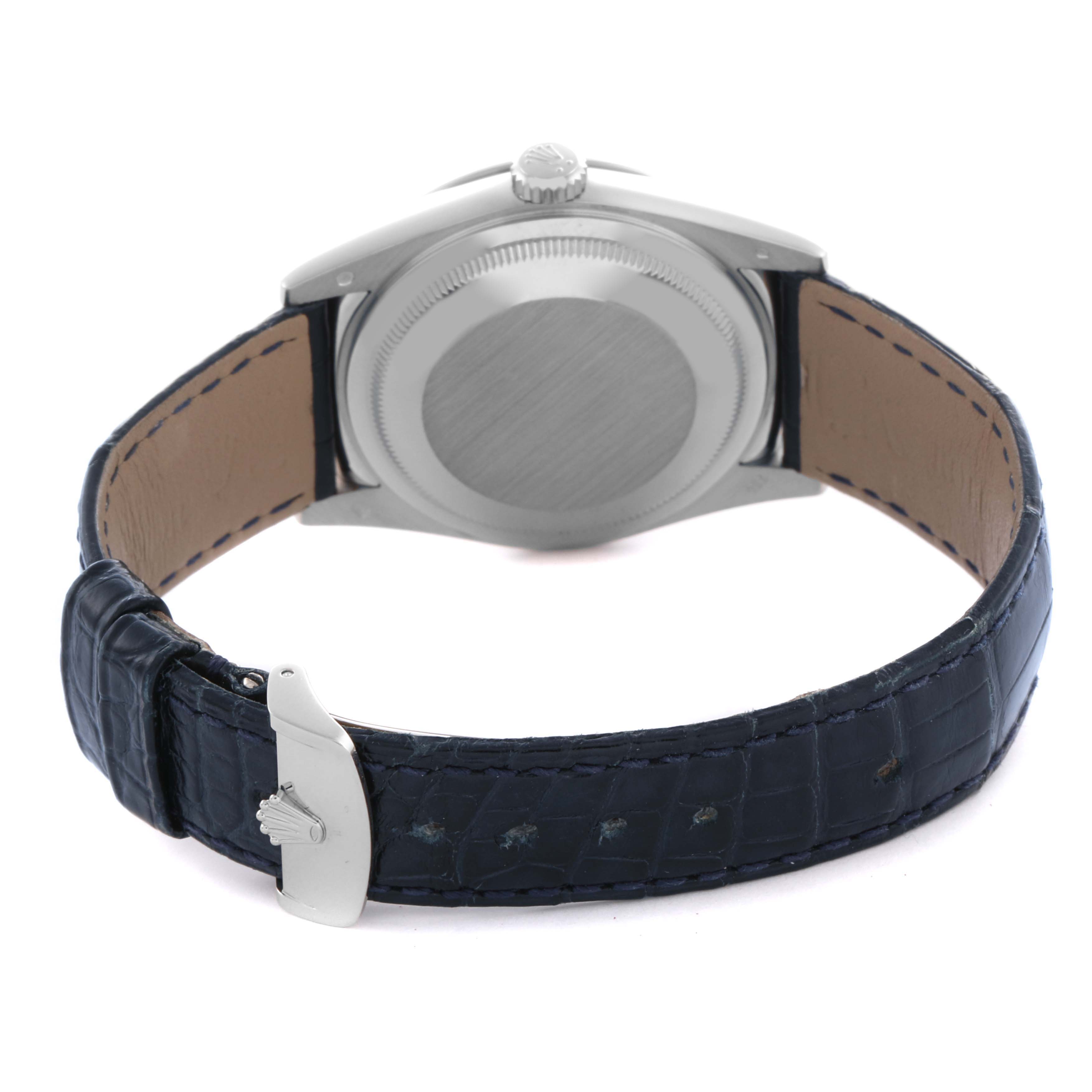 The image shows the back case and leather strap of the Rolex President 118139 Men's White Gold Blue Dial 118139 Men's White Gold Blue Dial model at an angle highlighting the buckle.