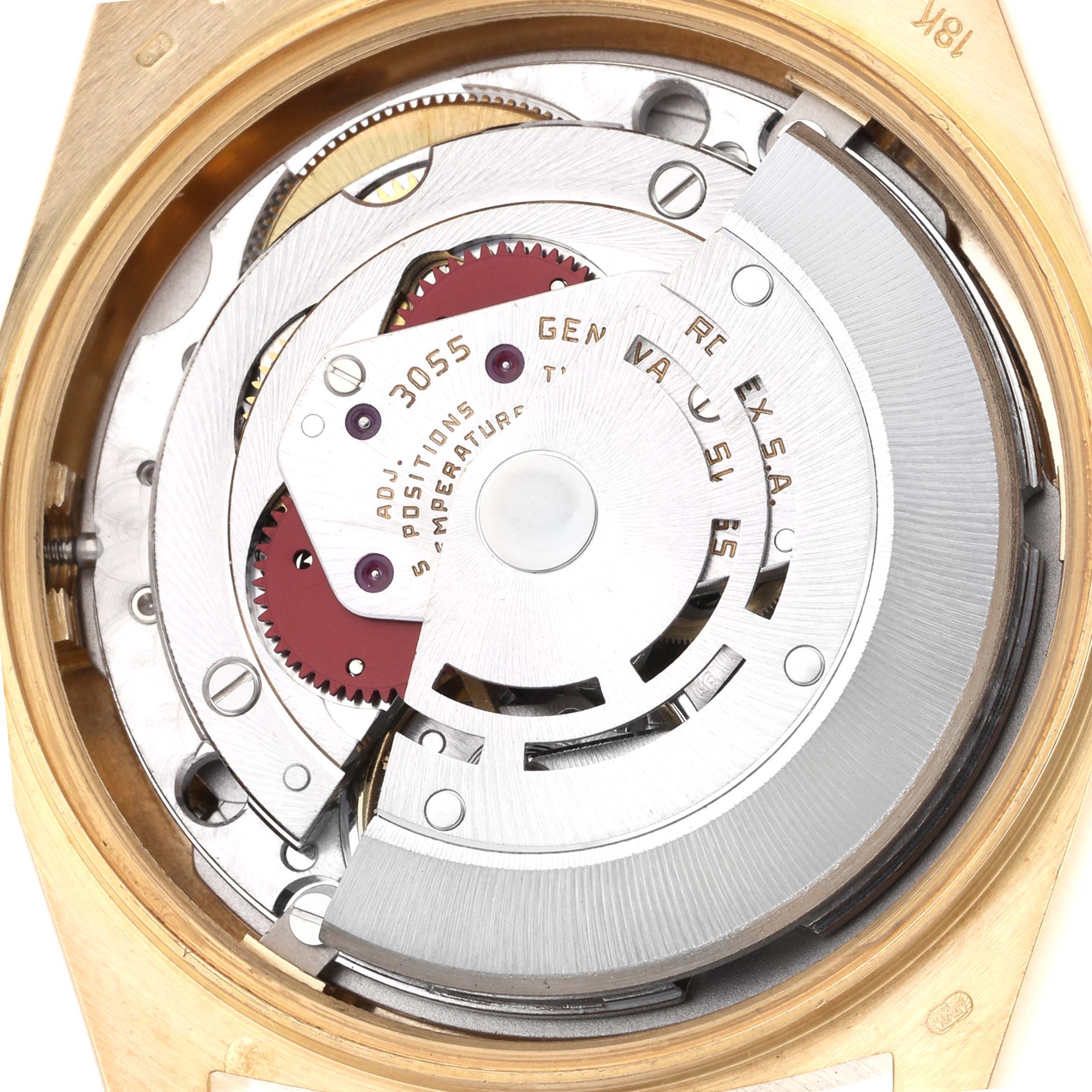 The image shows the inner movement of a Rolex President 18038 Men
s Yellow Gold Champagne Dial 18038 Men
s Yellow Gold Champagne Dial model, featuring gears and mechanisms viewed directly from the back.