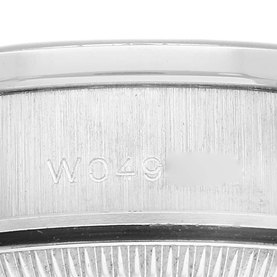 The image shows a close-up view of the case and reference number of a Rolex President 69136G Women's Platinum Silver Dial 69136G Women's Platinum Silver Dial model watch.