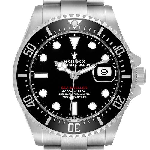 The Rolex Sea-Dweller 126600 Men's Stainless Steel Black Dial watch is shown from a front angle highlighting the dial, bezel, hands, and date magnifier.