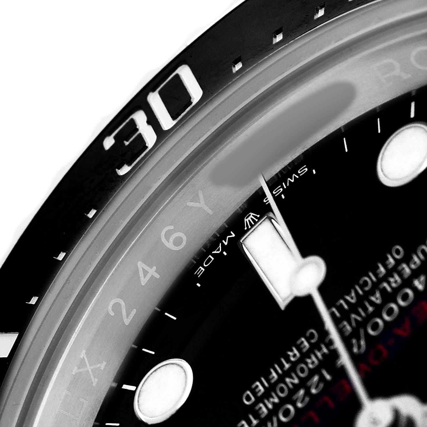 The close-up image shows the bezel, part of the dial, and text on the Rolex Sea-Dweller 126600 Men's Stainless Steel Black Dial watch.