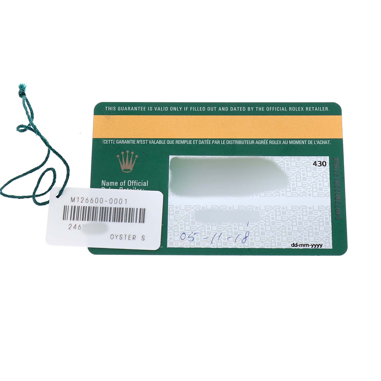 The image shows the warranty card for a Rolex Sea-Dweller 126600 Men's Stainless Steel Black Dial, displayed flat with a barcode tag attached.