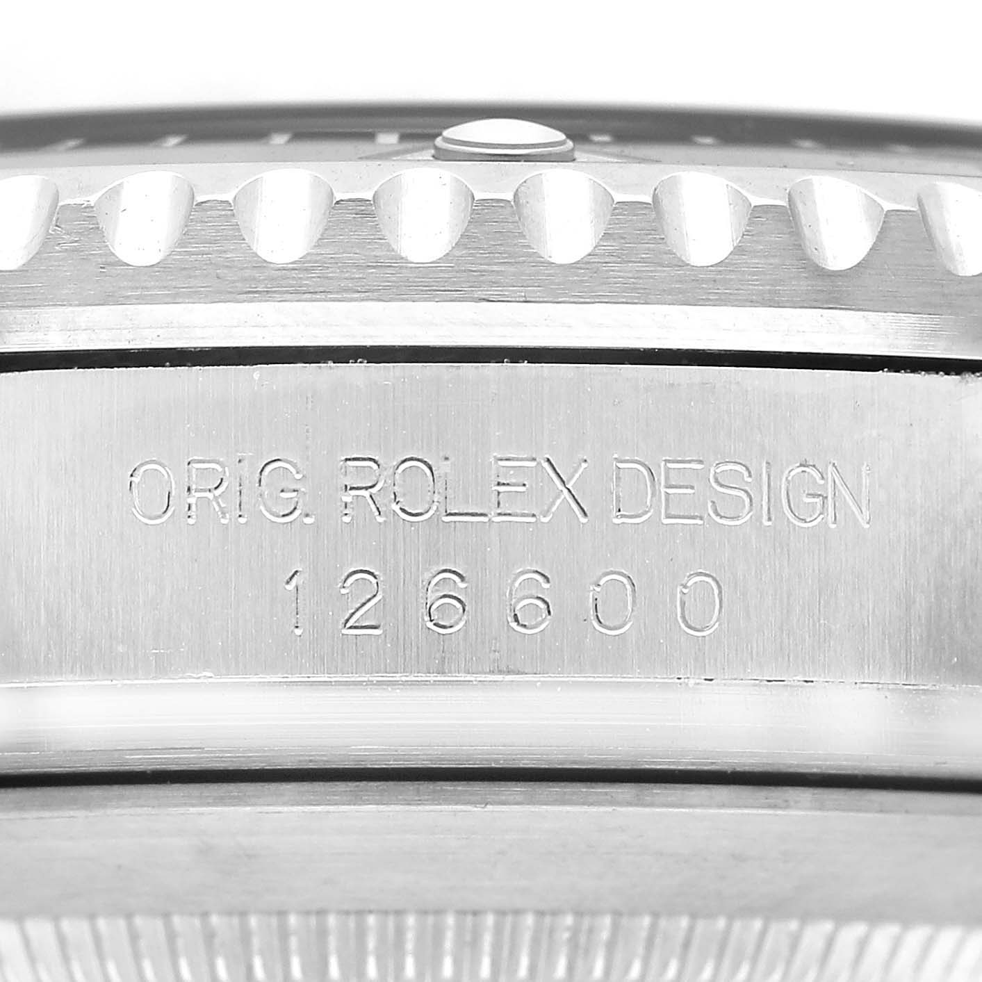 The image shows the side case of the Rolex Sea-Dweller 126600 Men's Stainless Steel Black Dial, displaying the model number "126600" with a focus on the engraved parts.