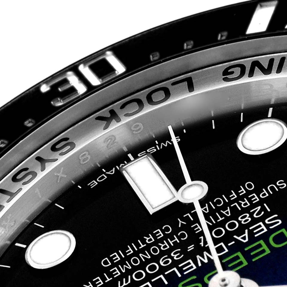 The image shows a close-up of the dial, bezel, and part of the face of a Rolex Sea-Dweller 116660 Men's Stainless Steel Blue Dial 116660 Men's Stainless Steel Blue Dial watch.