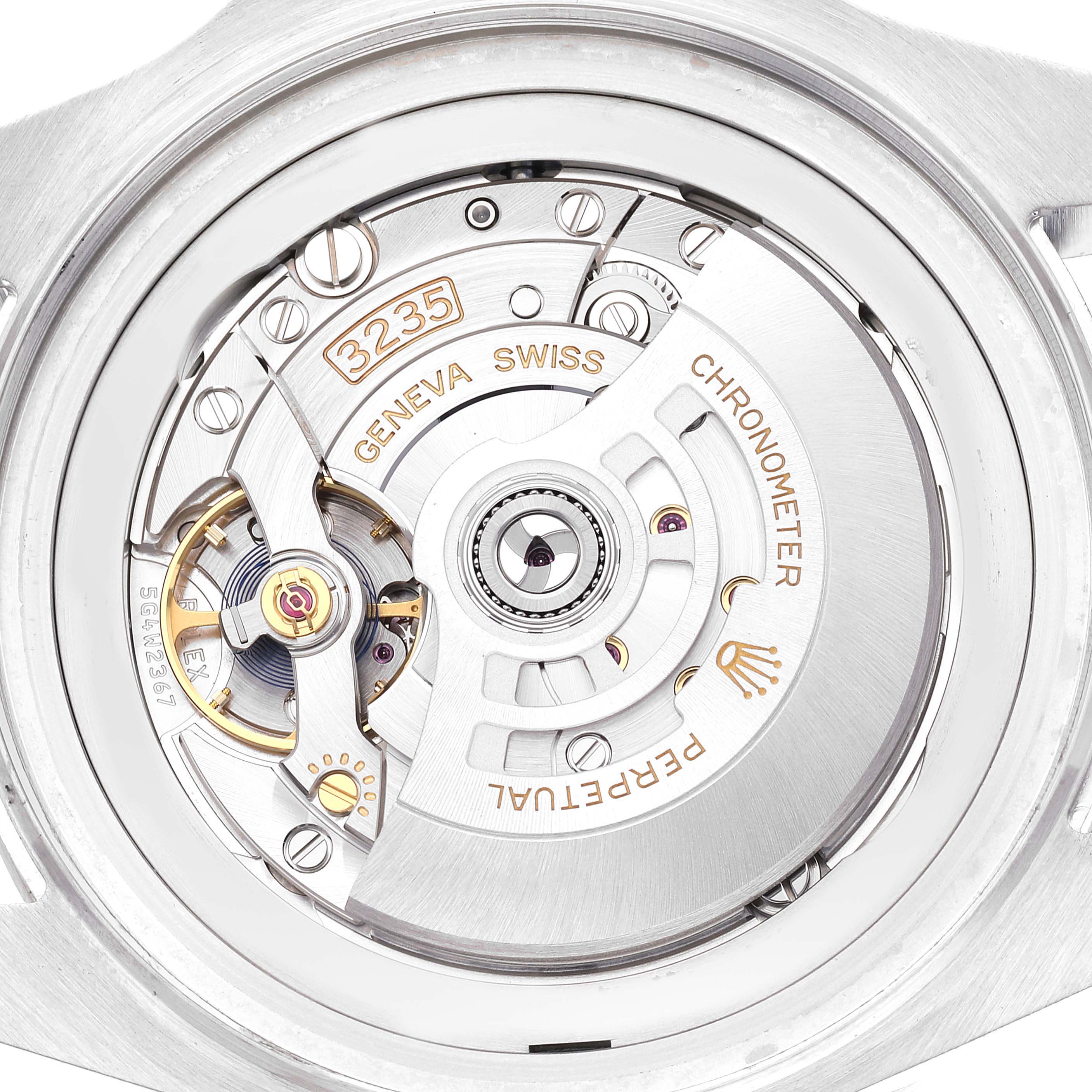 The image shows a close-up of the movement inside a Rolex Sea-Dweller 136660 Men's Stainless Steel Blue Dial watch from a top-down angle.