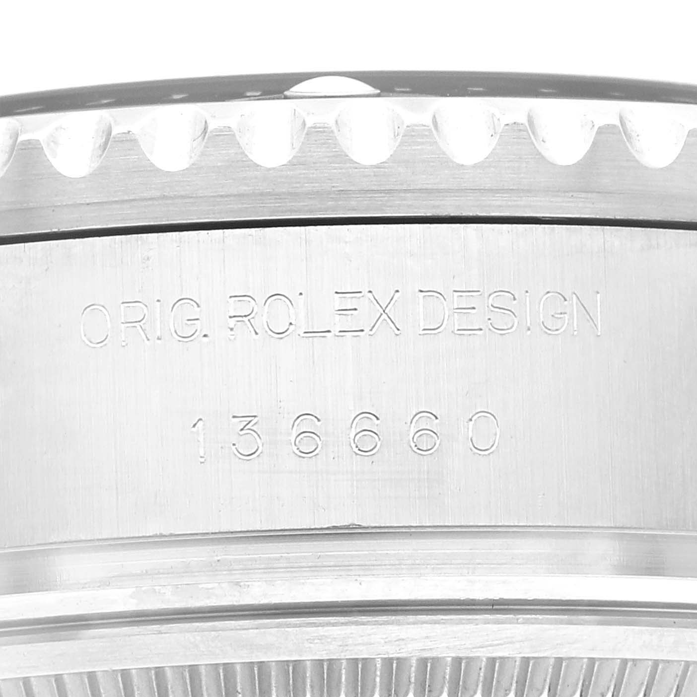 The image shows a close-up of the side of the Rolex Sea-Dweller 136660 Men's Stainless Steel Blue Dial, highlighting the engraved "ORIG. ROLEX DESIGN" and model number 136660.