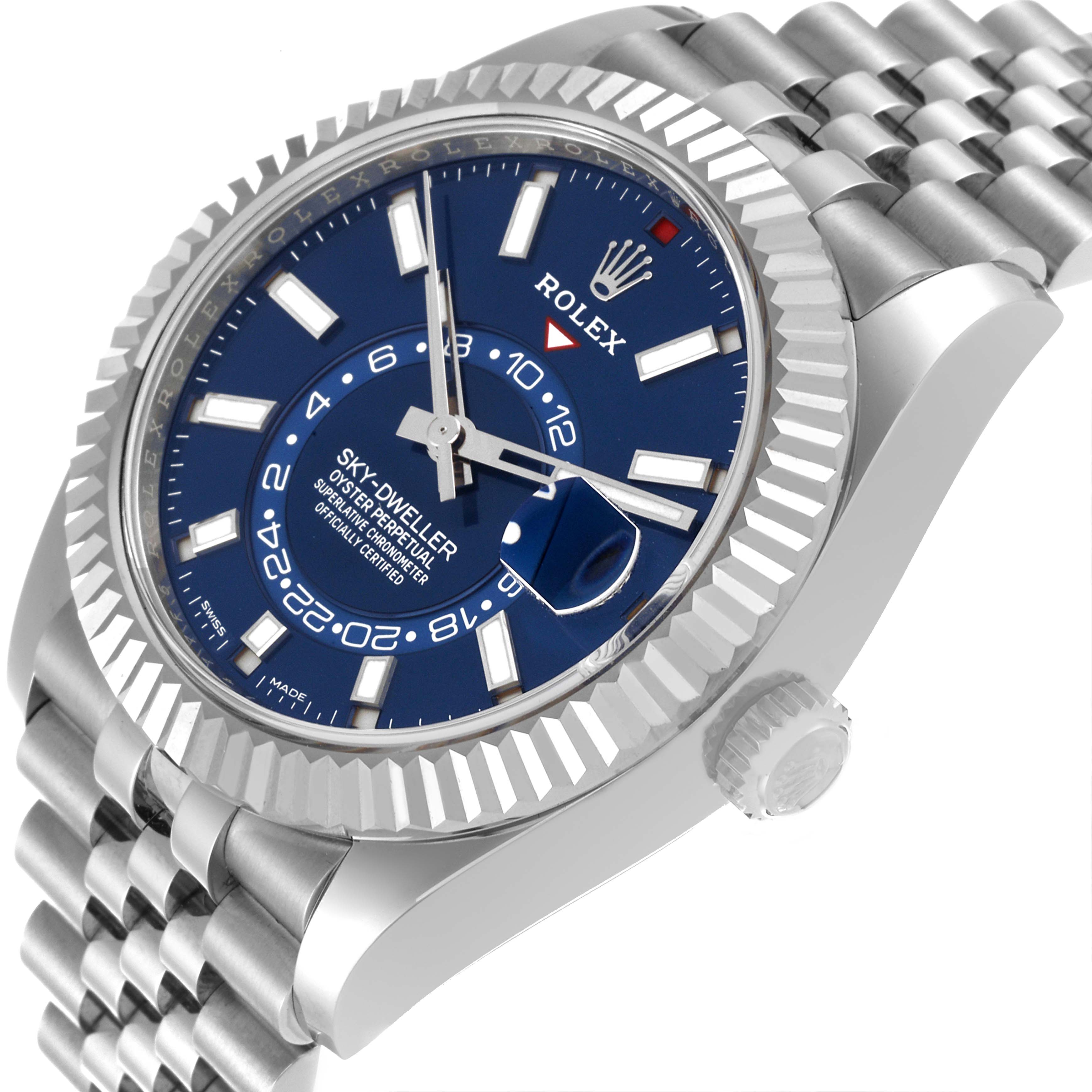 The image shows a close-up angled view of the dial, bezel, and part of the band of the Rolex Sky-Dweller 326934 Men's Stainless Steel Blue Dial 326934 Men's Stainless Steel Blue Dial watch.