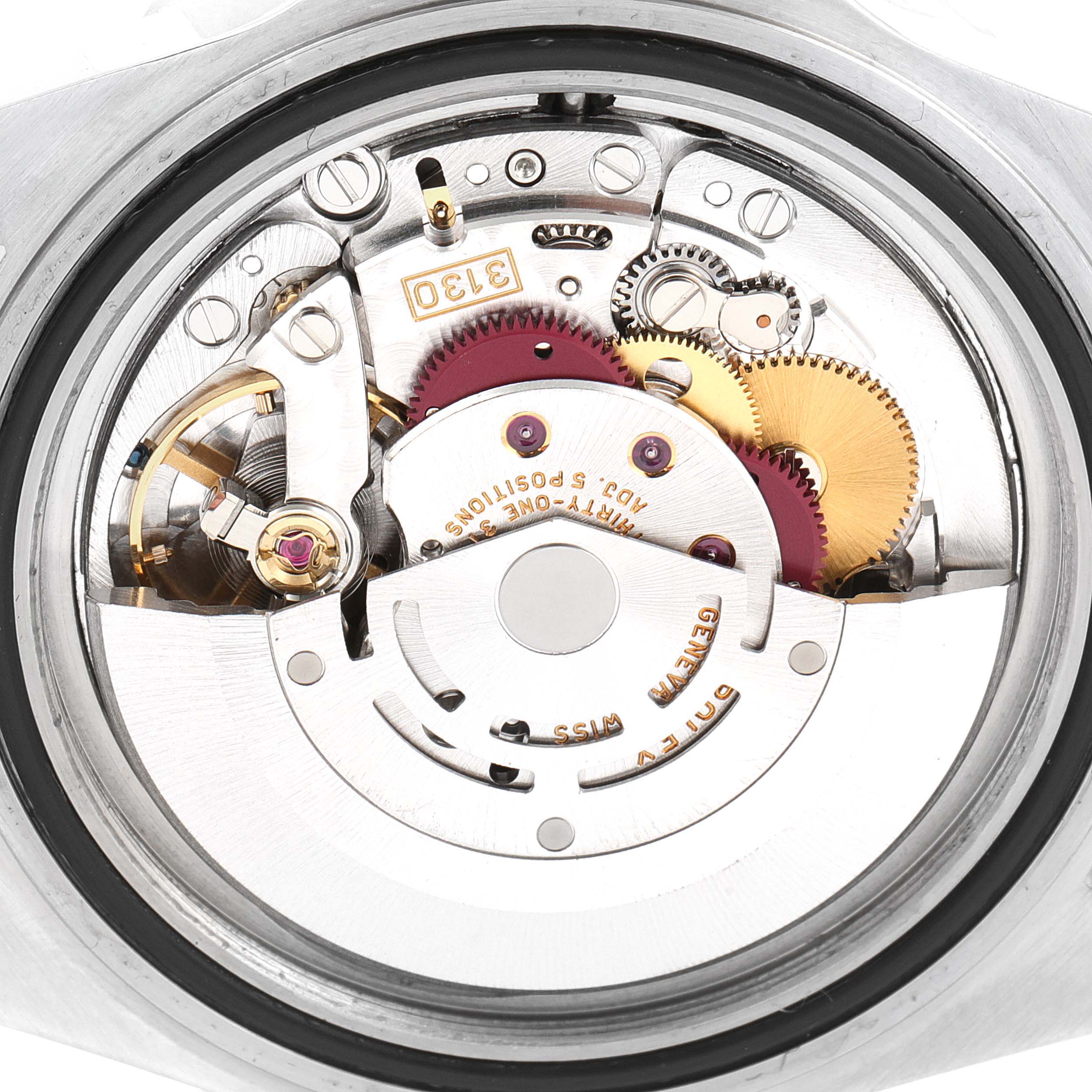 This image shows a close-up view of the internal movement mechanism of a Rolex Submariner 14060 Men
s Stainless Steel Black Dial 14060 Men
s Stainless Steel Black Dial watch.