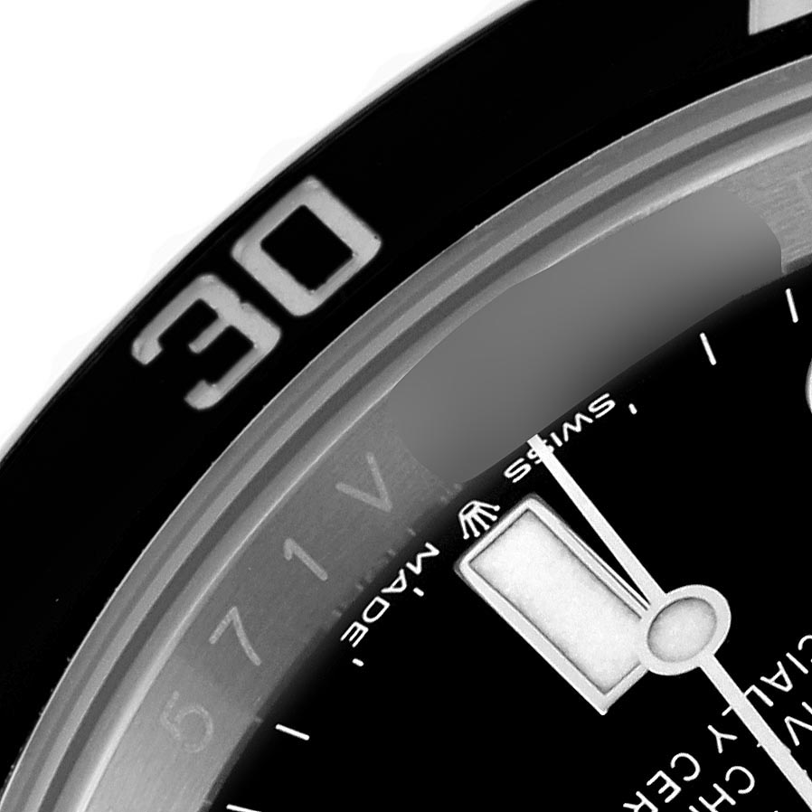 The image shows a close-up angle of the bezel and part of the dial of a Rolex Submariner 126610LN Men's Stainless Steel Black Dial 126610LN Men's Stainless Steel Black Dial, highlighting the minute markers.