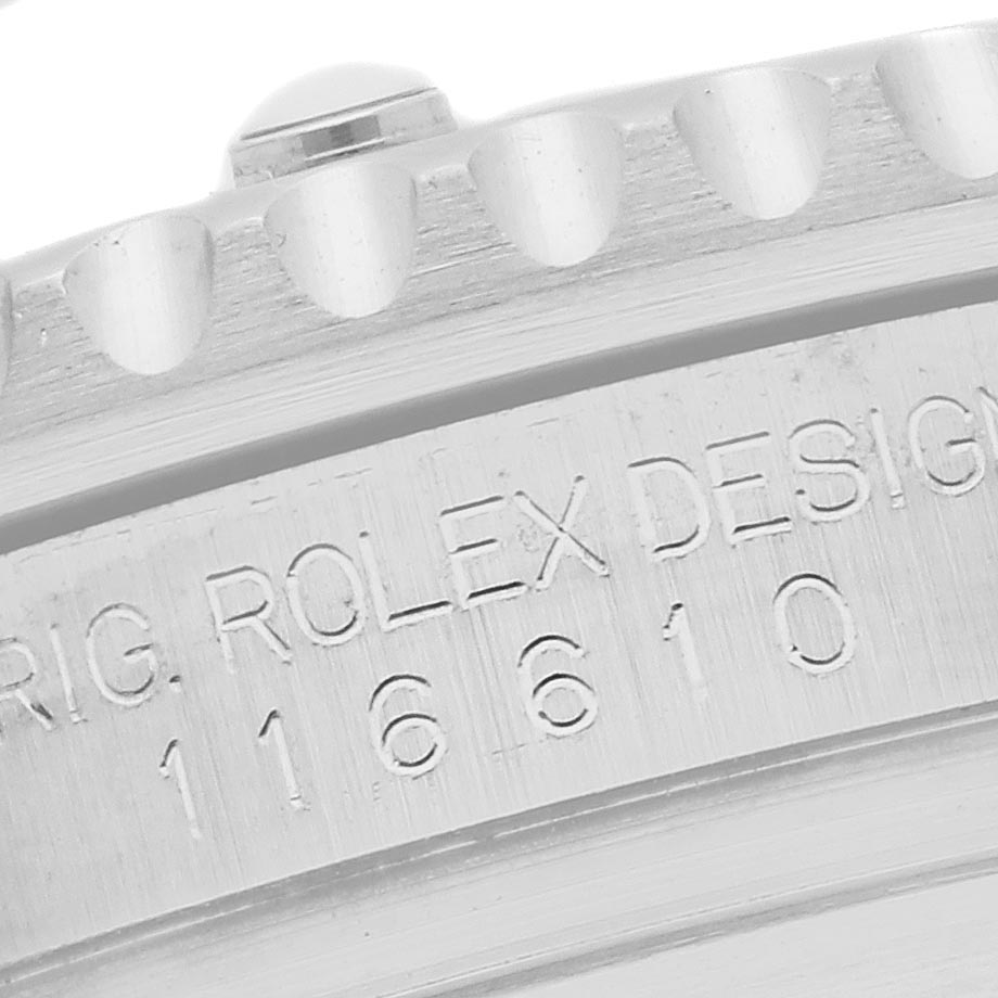 The image shows a close-up of the engraved bezel edge and side of a Rolex Submariner 116610LN-0001 Men's Stainless Steel Black Dial 116610LN-0001 Men's Stainless Steel Black Dial watch.