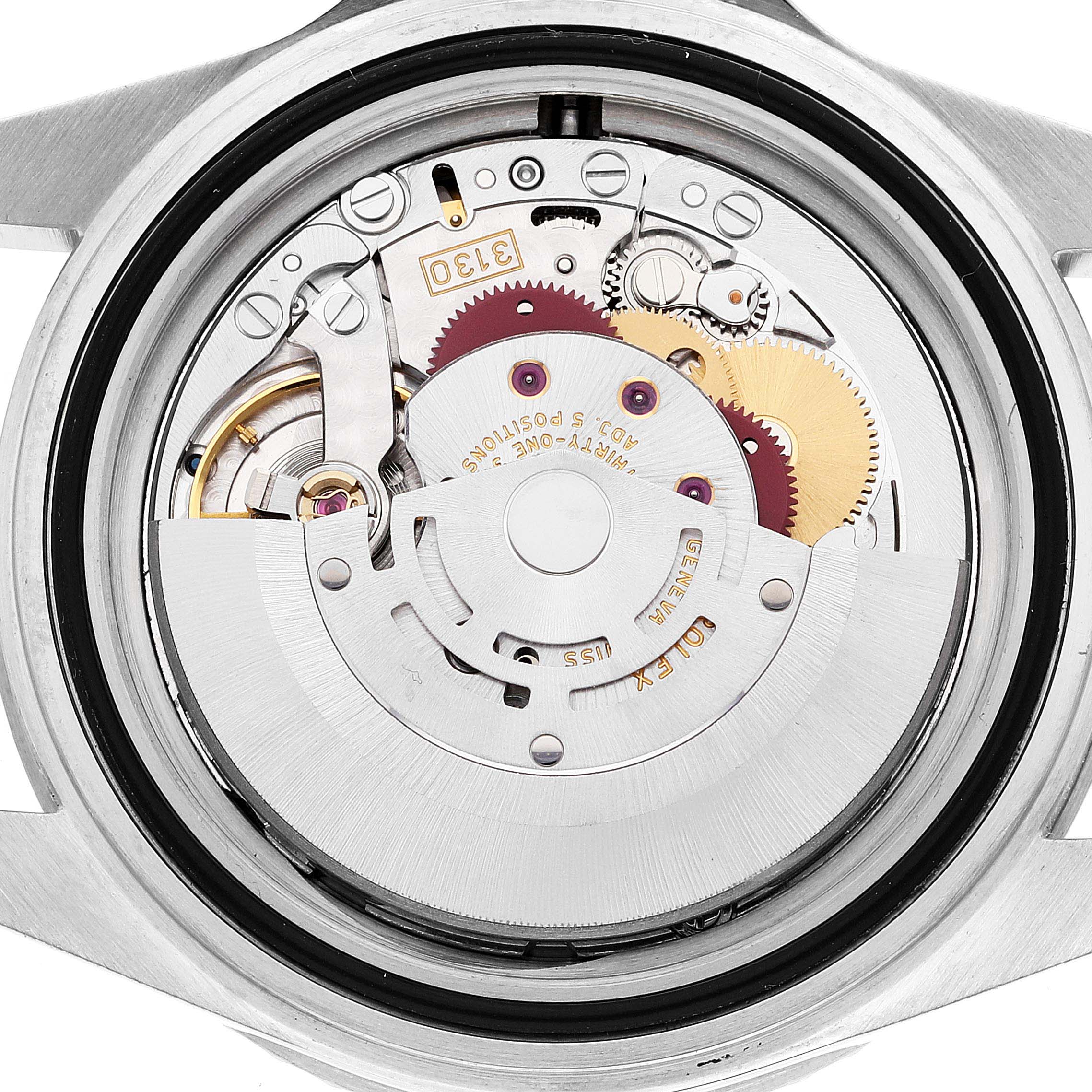 The image shows the intricate internal mechanism of the Rolex Submariner 14060M Men's Stainless Steel Black Dial 14060M Men's Stainless Steel Black Dial watch from a back view angle.