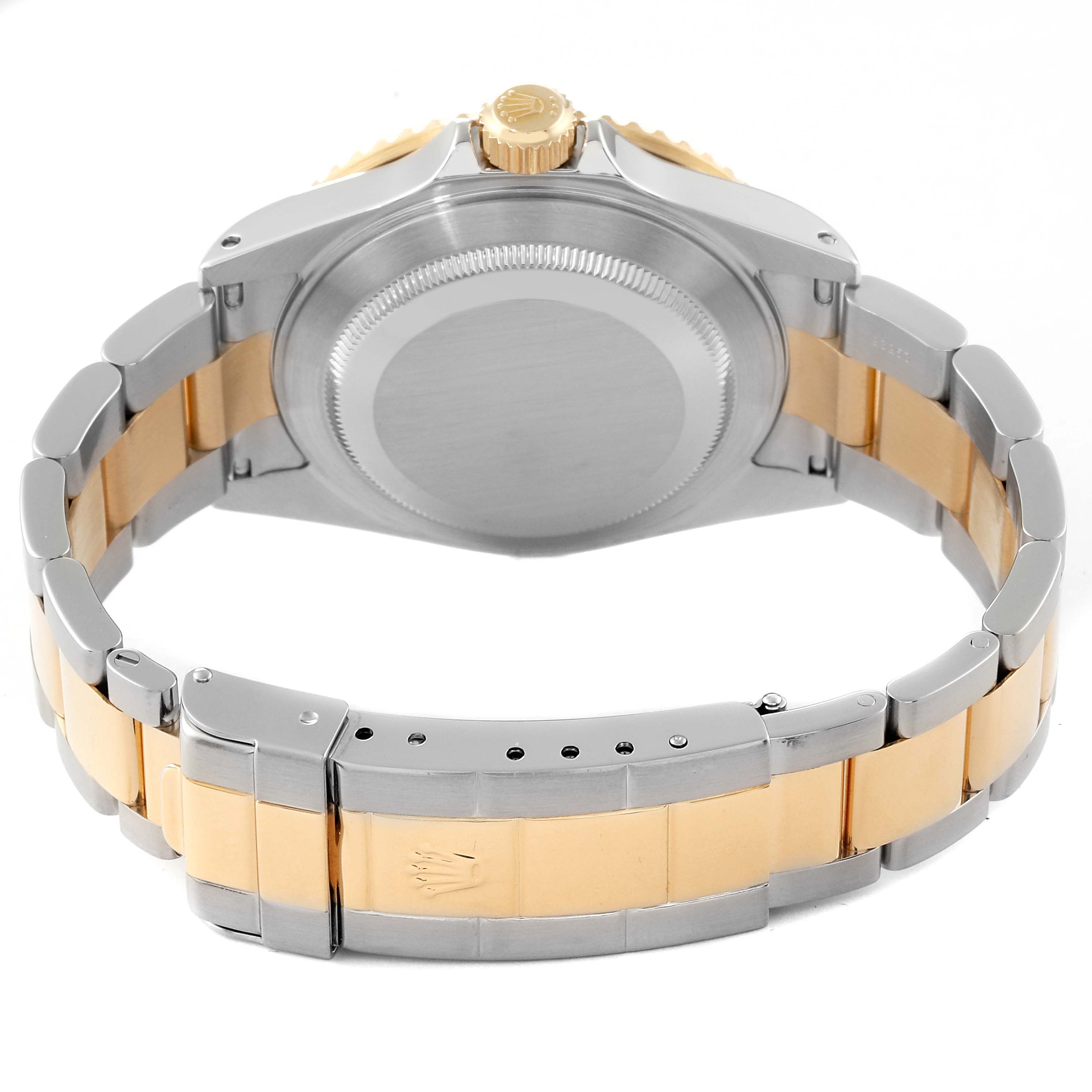 The image shows the back view of a Rolex Submariner 16613LB Men's Steel and Gold (two tone) Champagne Dial 16613LB Men's Steel and Gold (two tone) Champagne Dial watch, highlighting the case back and two-tone bracelet.