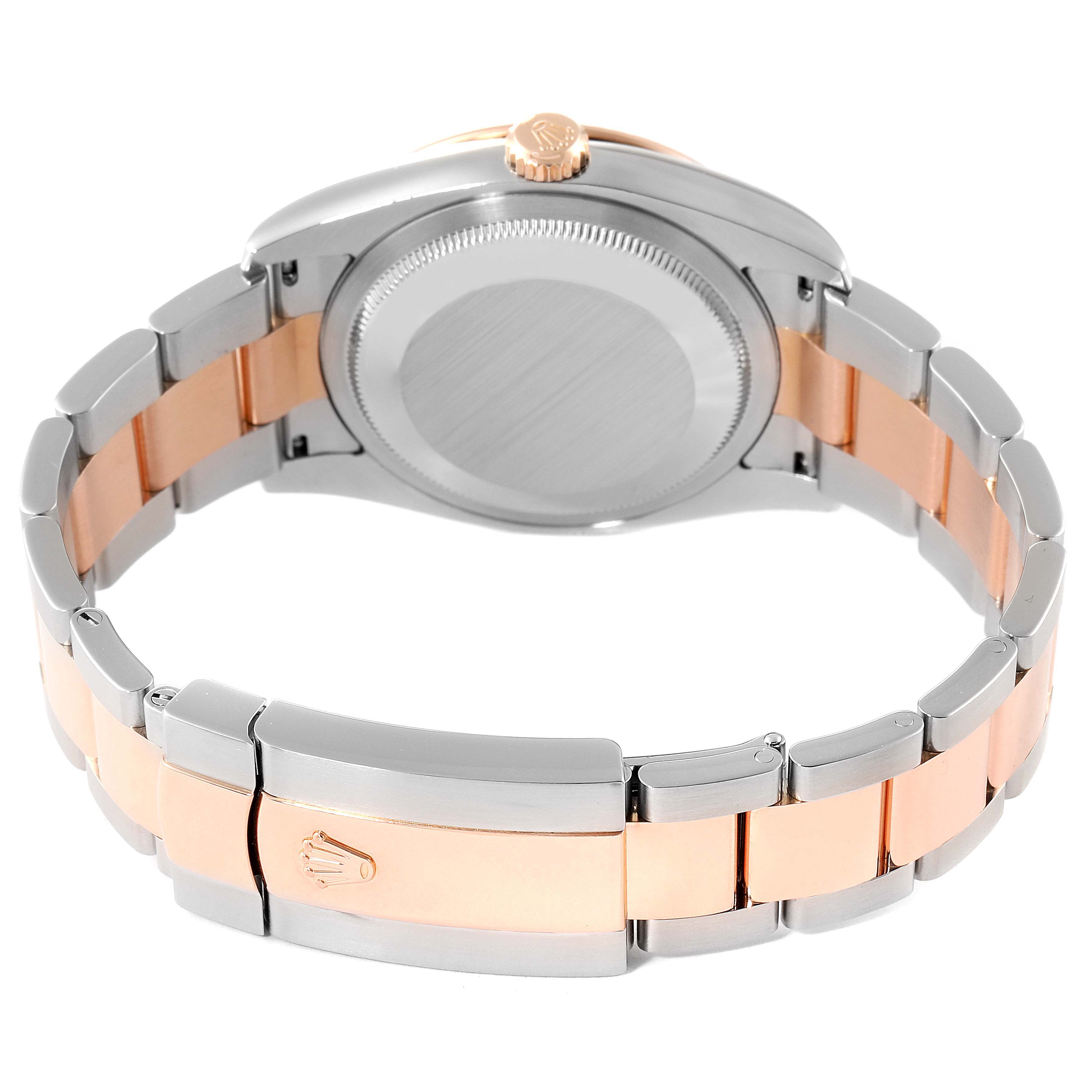 The image shows the back case, crown, and bracelet of a Rolex Turn-o-Graph 116261 Men
s Steel and Gold (two tone) Black Dial 116261 Men
s Steel and Gold (two tone) Black Dial watch from a rear angle.