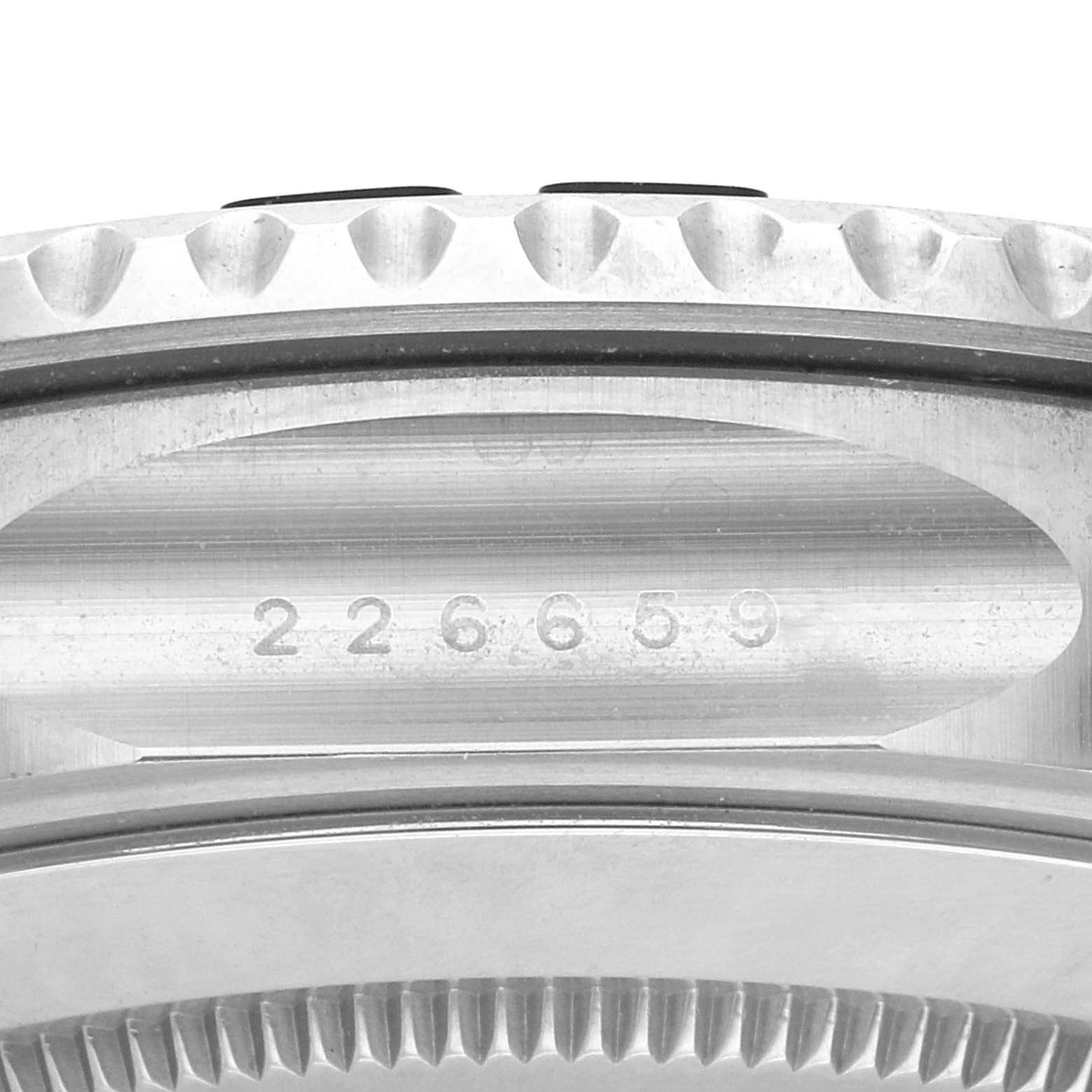 Close-up of the side view showing the Rolex Yacht-Master 226659 Men's White Gold Black Dial 226659 Men's White Gold Black Dial's model number and edges of the bezel.