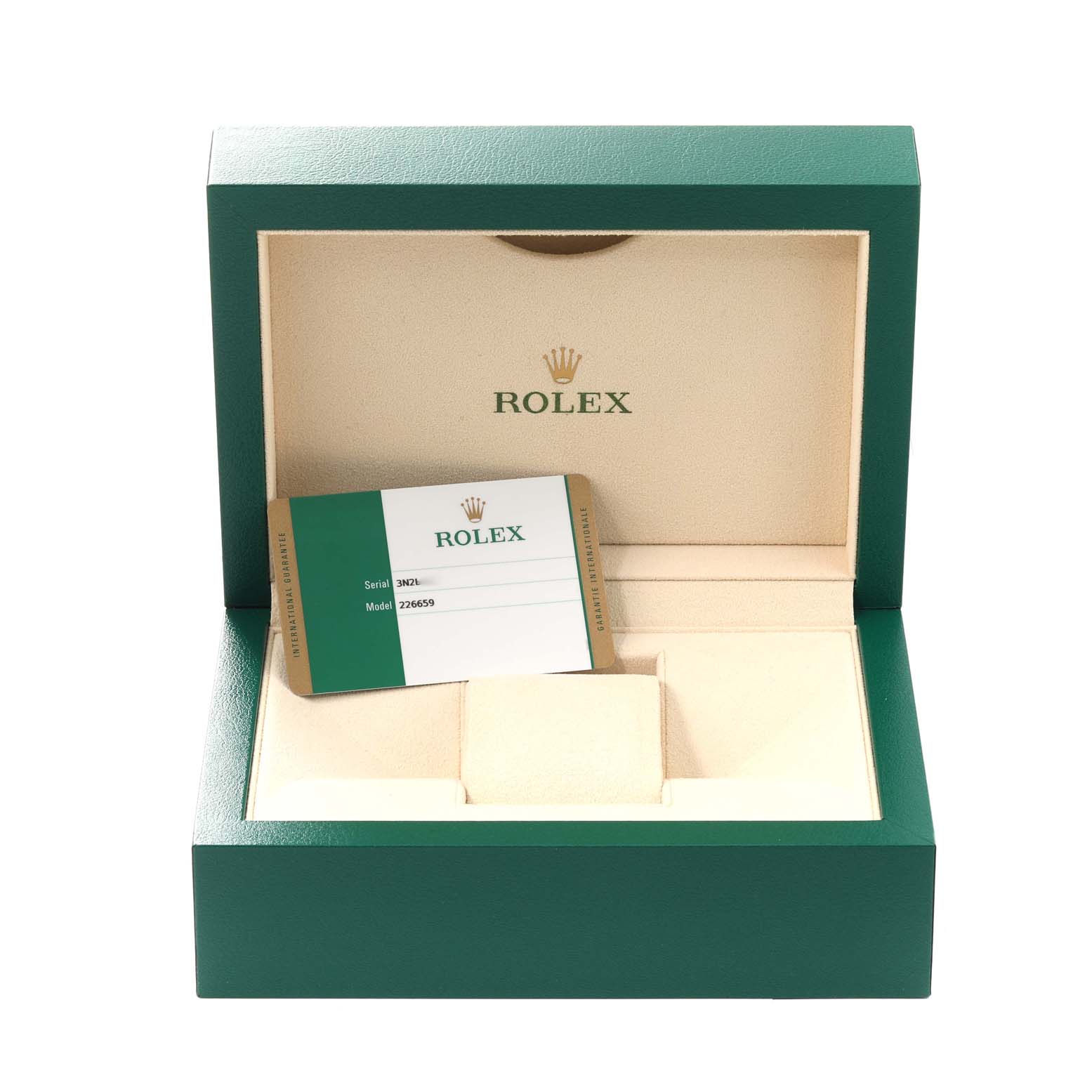 The image shows an open Rolex watch box with the Yacht-Master model card visible inside.