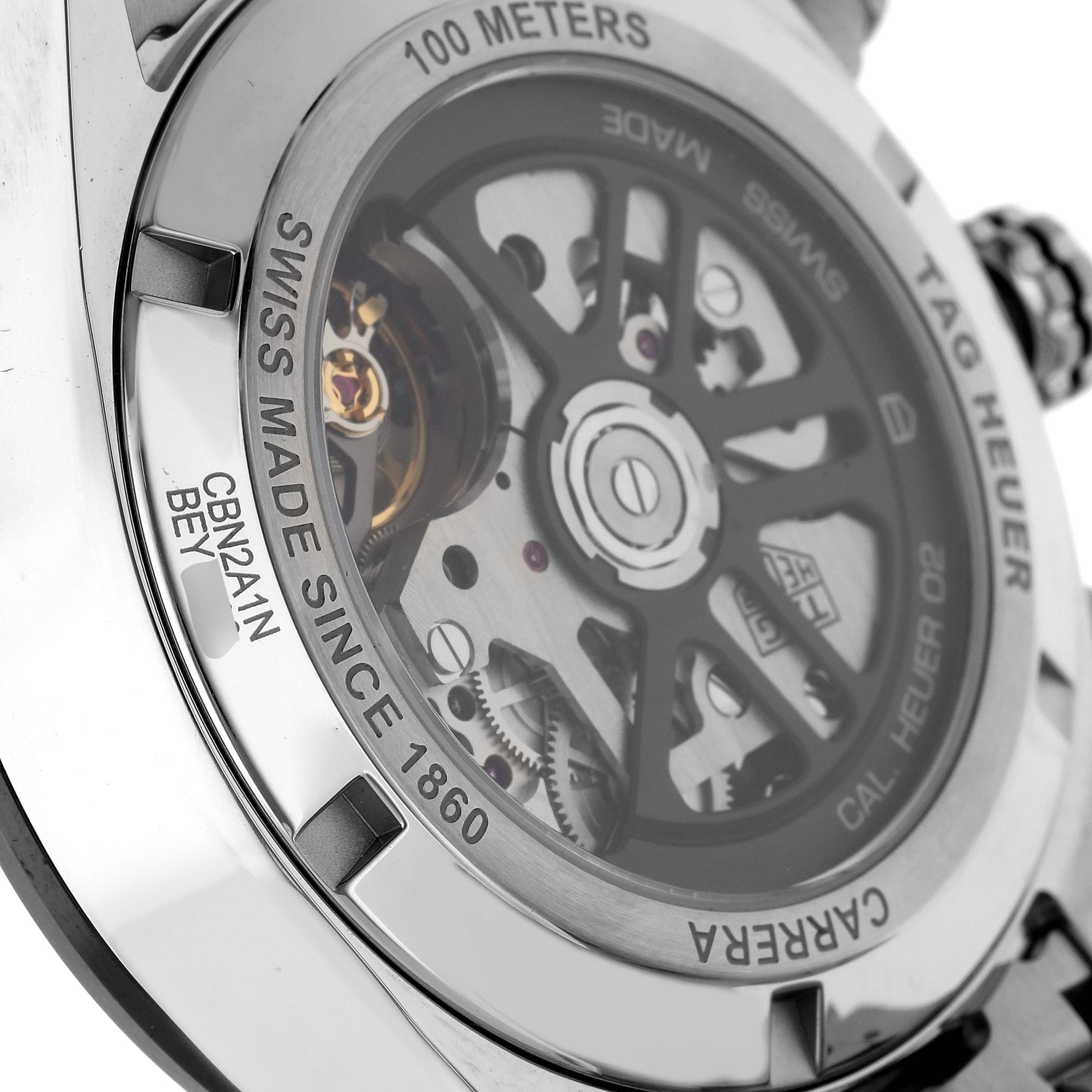 This image shows the back of the Tag Heuer Carrera CBN2A1N Men's Stainless Steel Green Dial CBN2A1N Men's Stainless Steel Green Dial watch model, displaying its inner mechanics and inscriptions.
