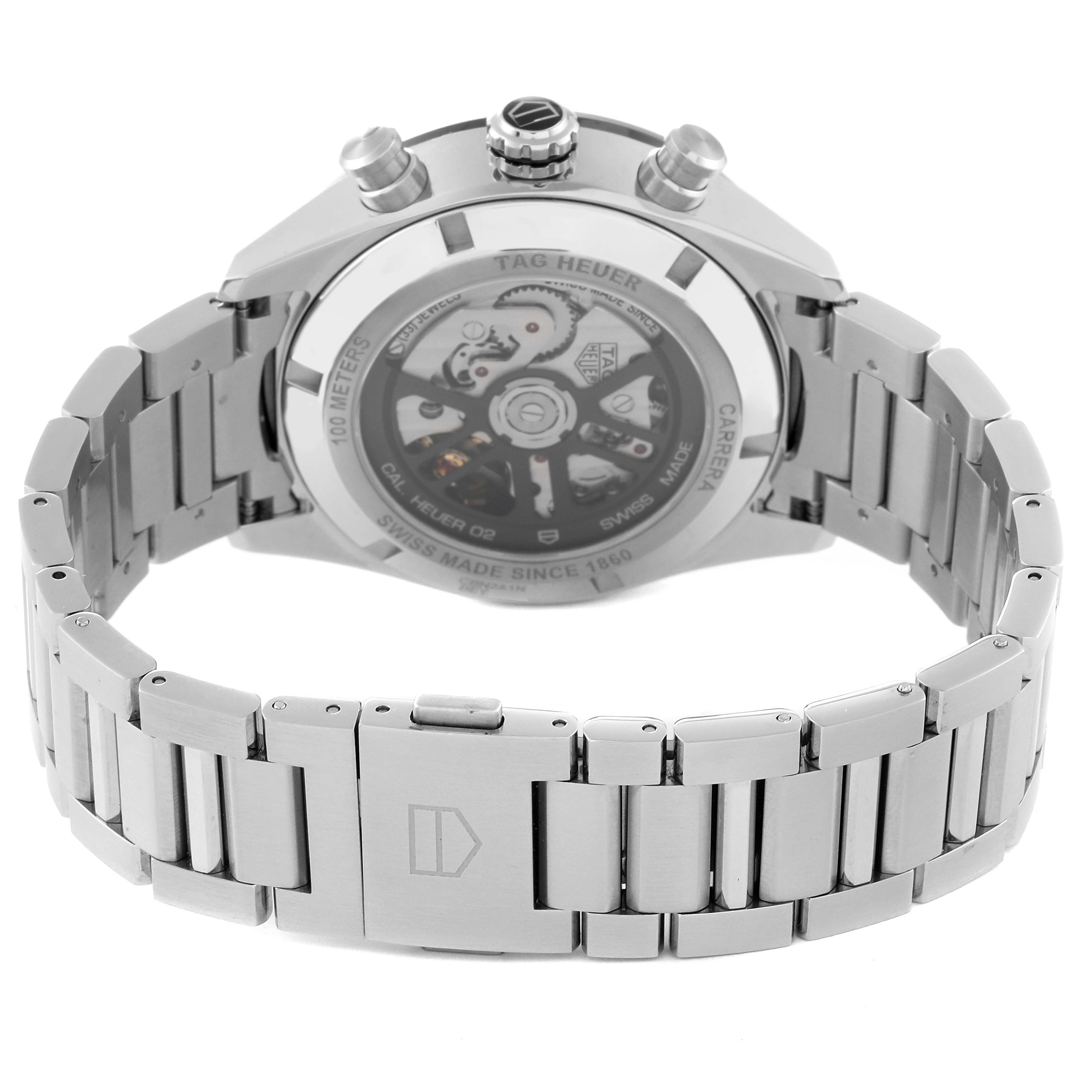 The image shows the back view of a Tag Heuer Carrera CBN2A1N Men's Stainless Steel Green Dial CBN2A1N Men's Stainless Steel Green Dial watch, highlighting its stainless steel bracelet and transparent case back.