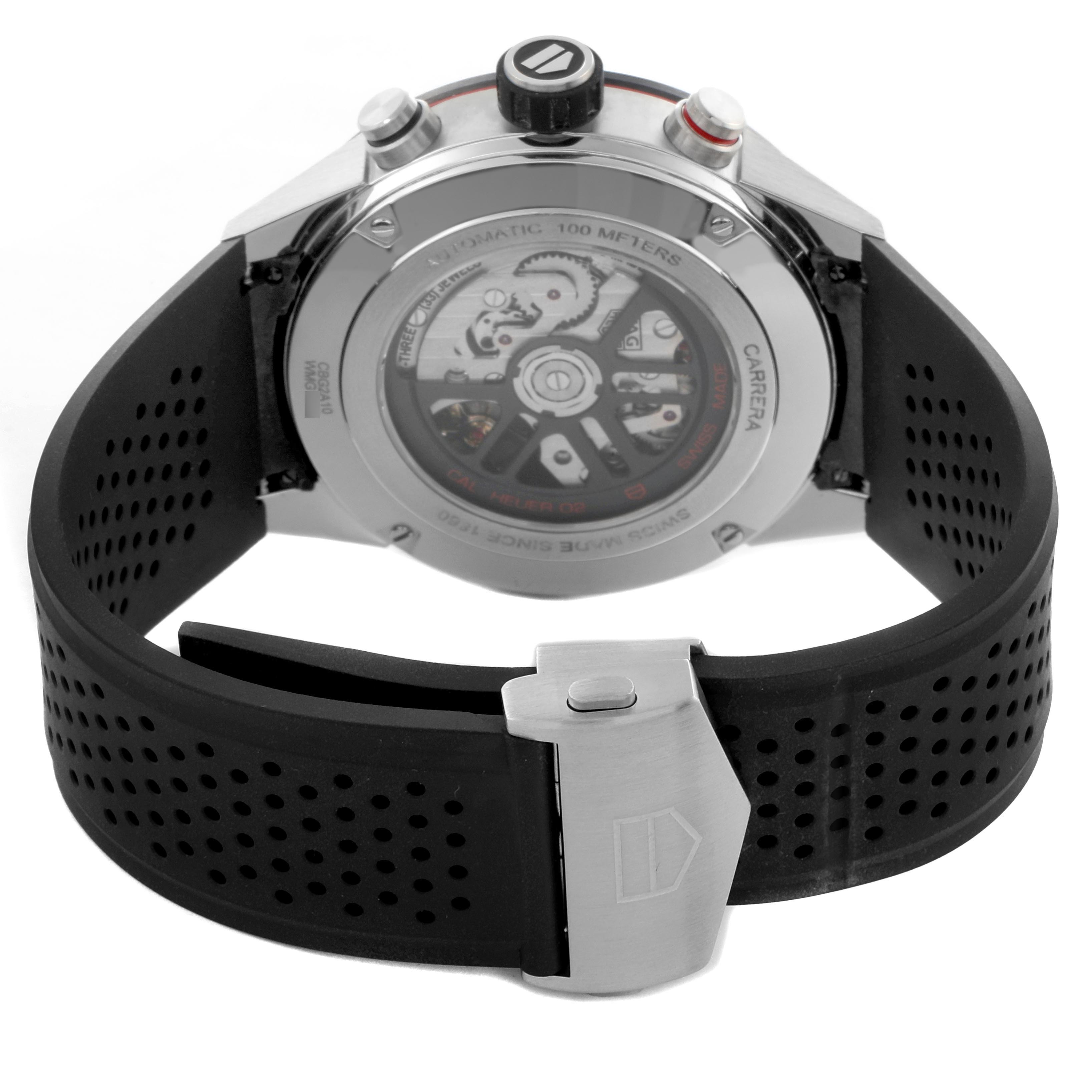 The image shows the back view of a Tag Heuer Carrera CBG2A10.FT6168 Men's Stainless Steel Transparent Dial CBG2A10.FT6168 Men's Stainless Steel Transparent Dial watch, highlighting its automatic movement and black perforated strap.