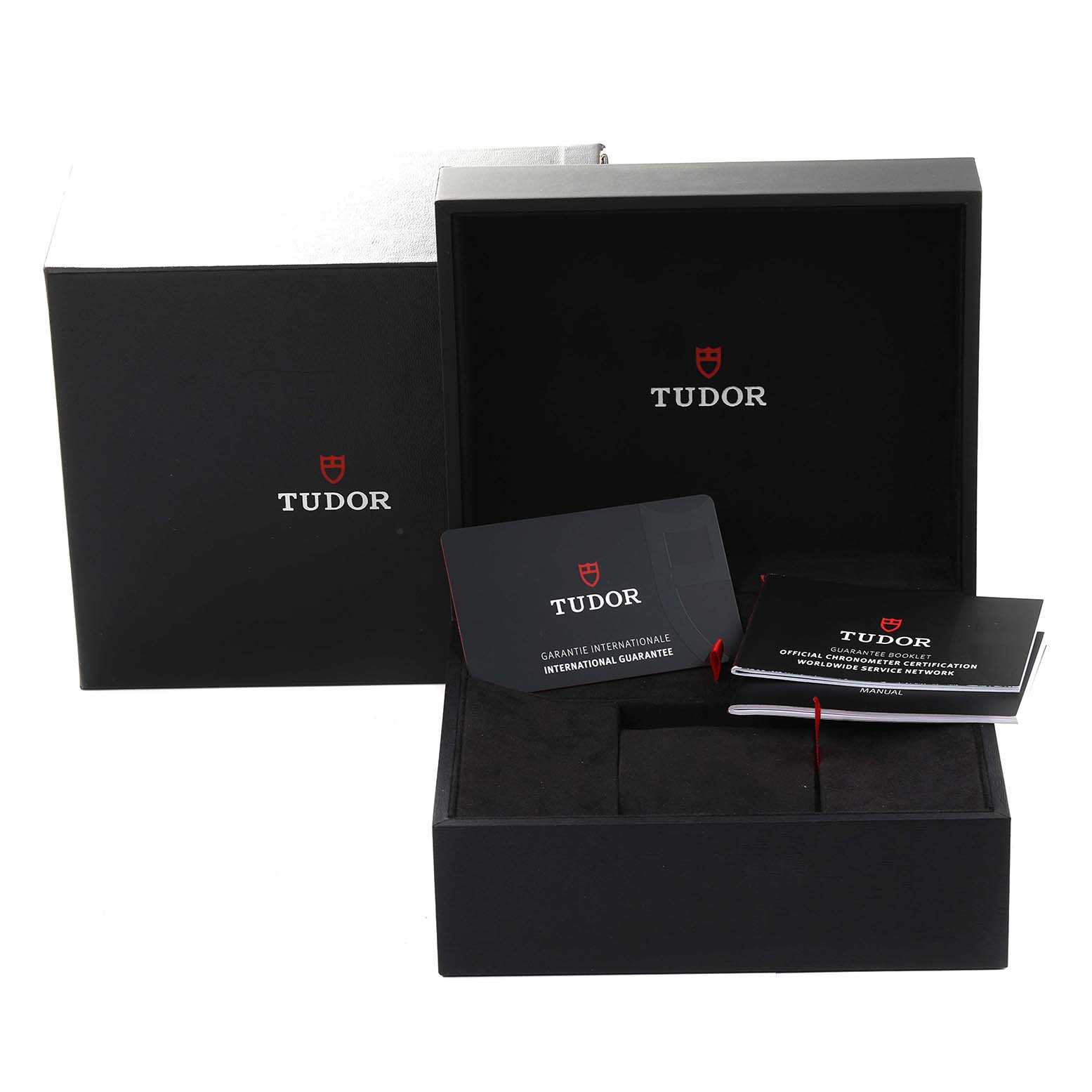The image shows the packaging, guarantee card, and manuals for the Tudor Heritage Black Bay 79363N Men's Steel and Gold (two tone) Black Dial 79363N Men's Steel and Gold (two tone) Black Dial watch.