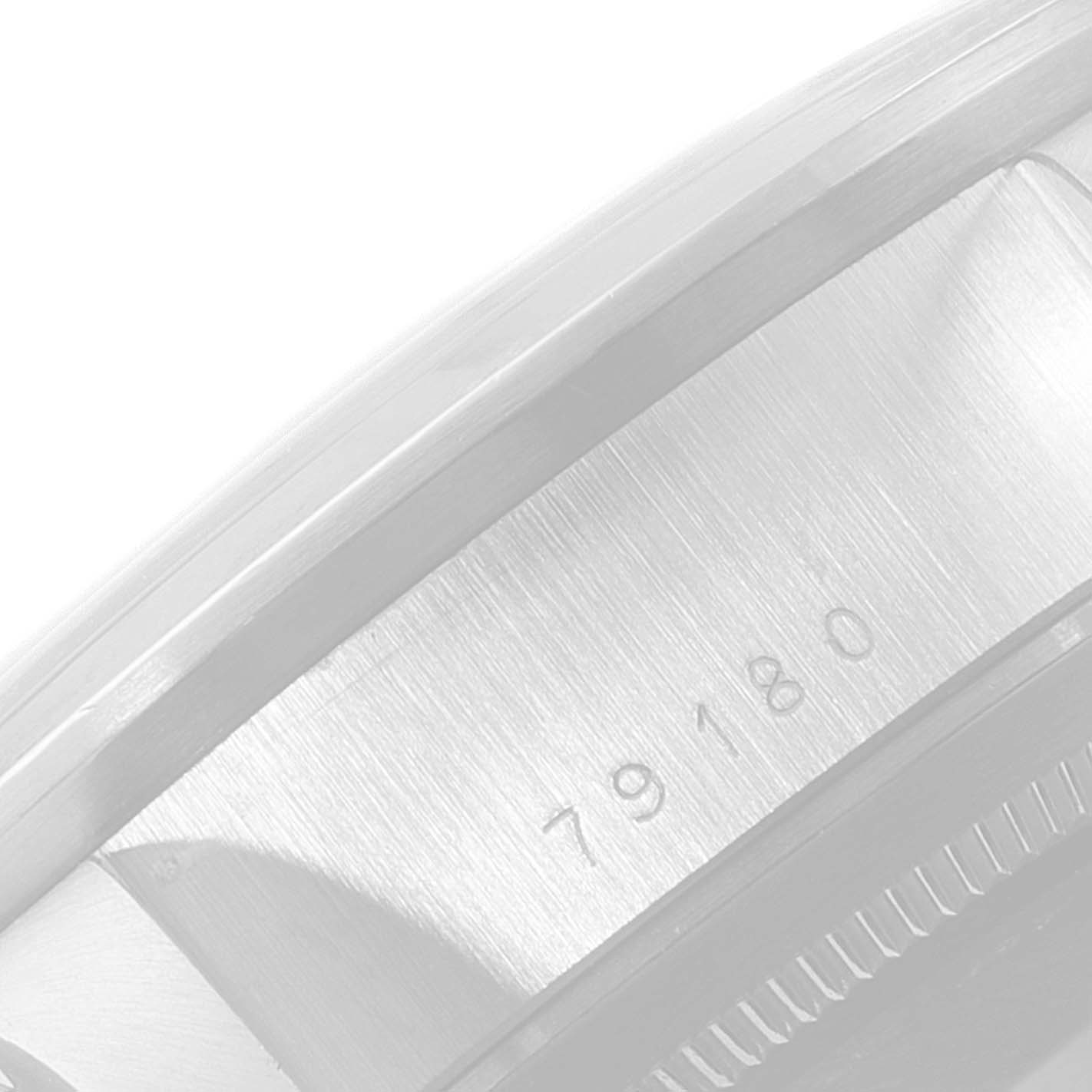 The image shows a close-up side view of the case of a Tudor Prince 79180 Men's Stainless Steel Silver Dial 79180 Men's Stainless Steel Silver Dial model watch, focusing on the engraved model number 79180.