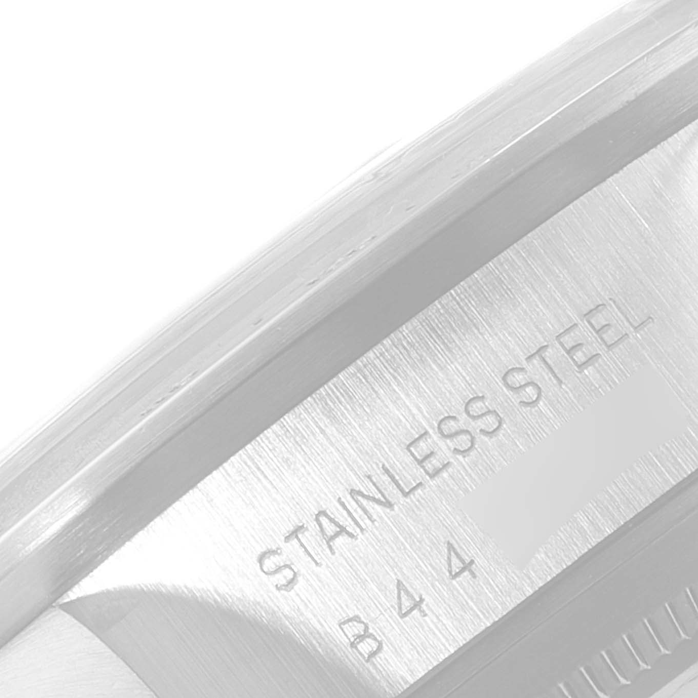 This image shows a close-up of the stainless steel side of the Tudor Prince 79180 Men's Stainless Steel Silver Dial 79180 Men's Stainless Steel Silver Dial watch, highlighting the engraved text.