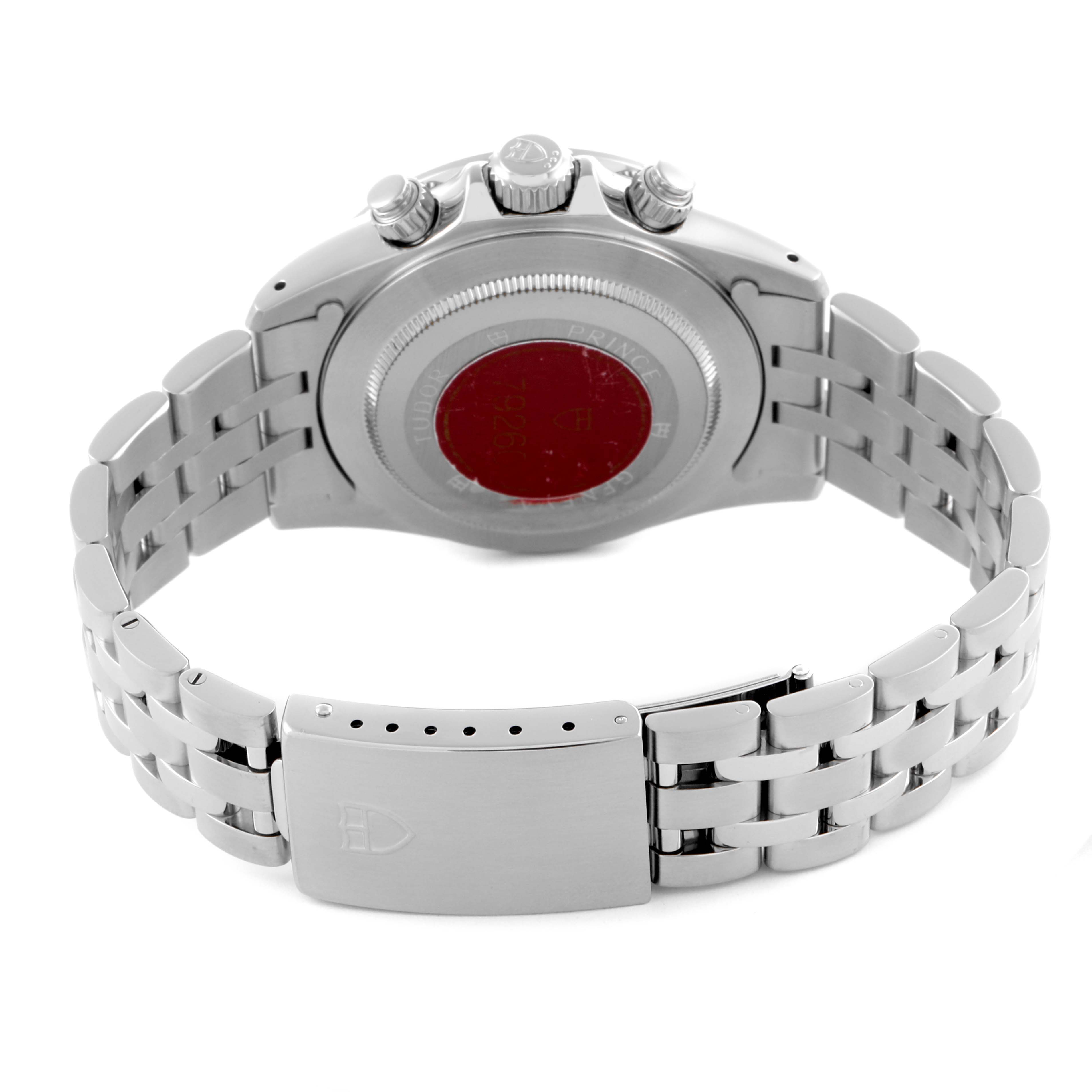 The image shows the back of a Tudor Tiger 79260 Men's Stainless Steel Orange Dial 79260 Men's Stainless Steel Orange Dial model watch at an angle highlighting the bracelet, clasp, and case back.